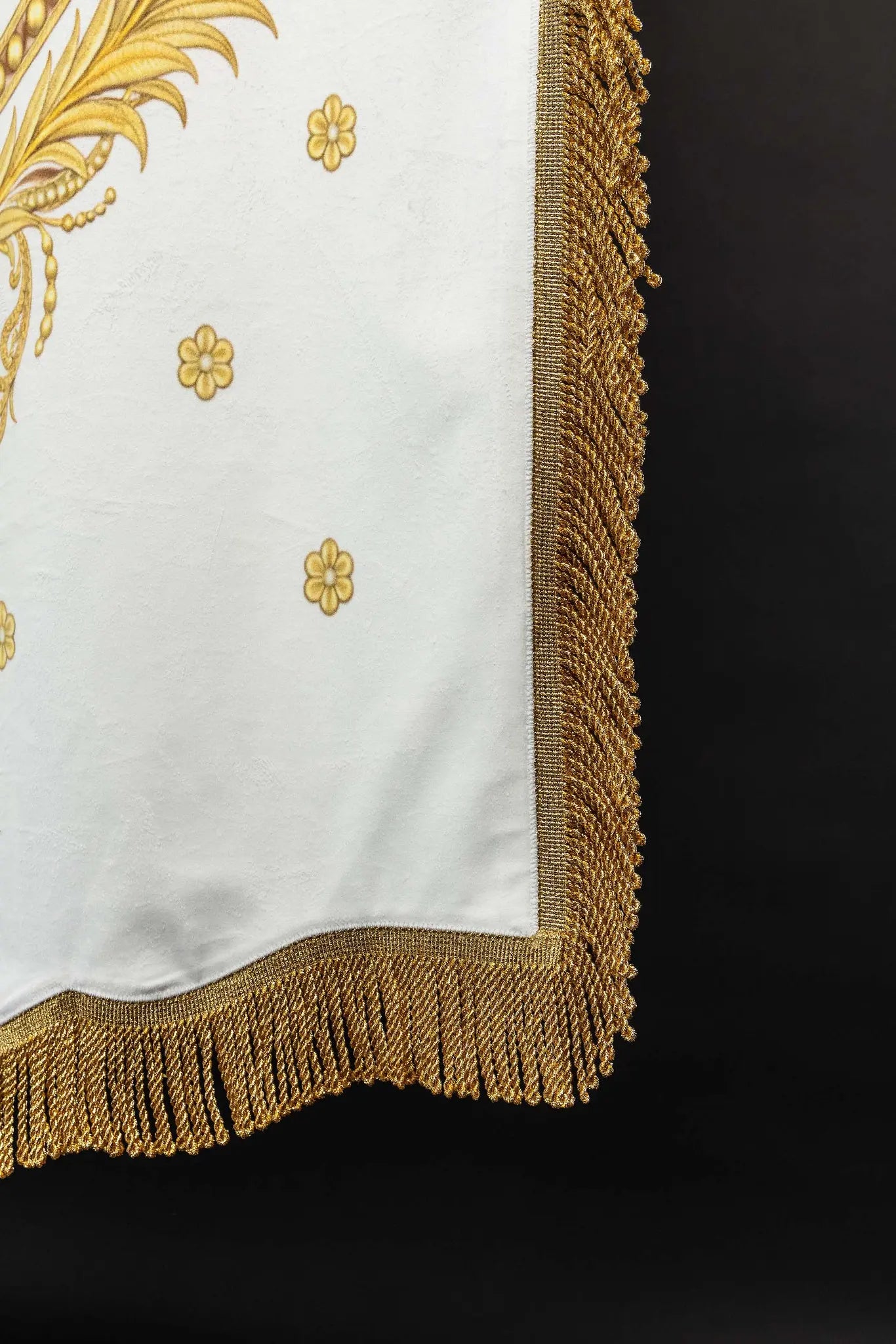 Double-sided processional banner with Our Lady of the Assumption on one side and a Marian monogram on the other, made of velour fabric with gold ornaments and fringes.