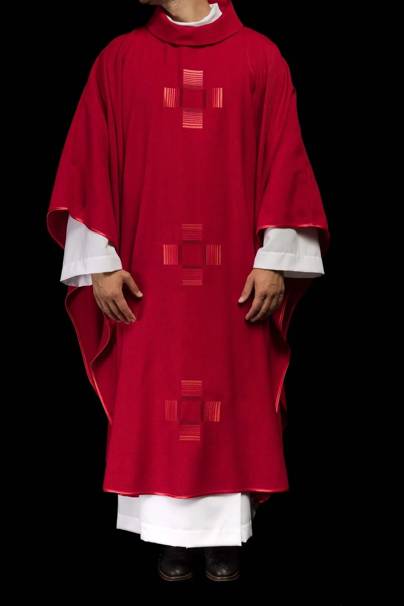 Red chasuble with embroidered crosses