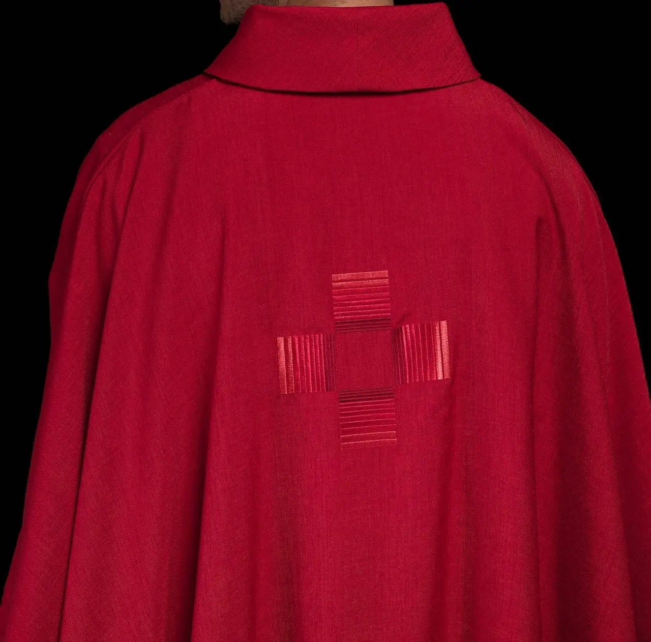 Red chasuble with embroidered crosses