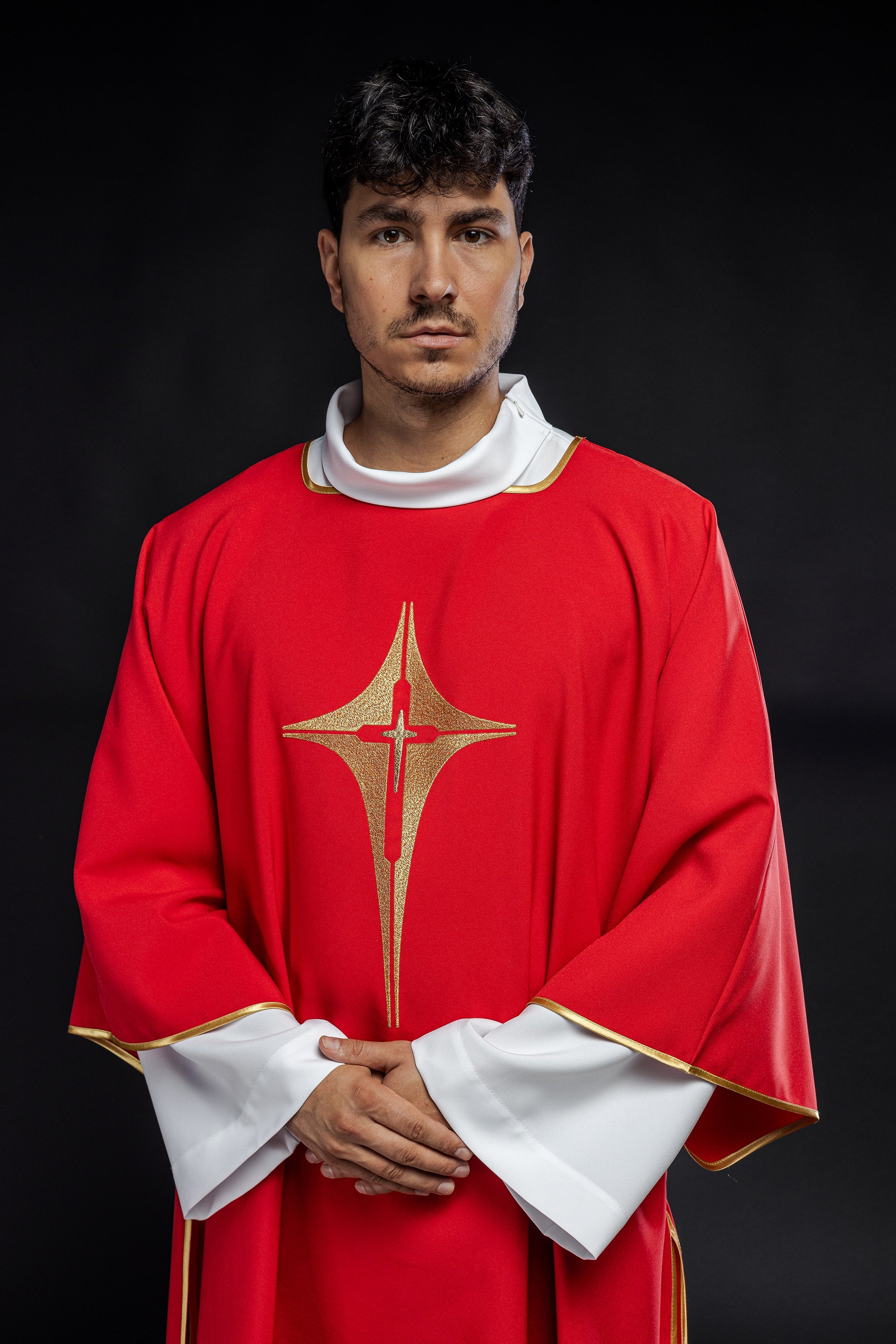 Red Dalmatia with embroidered gold cross