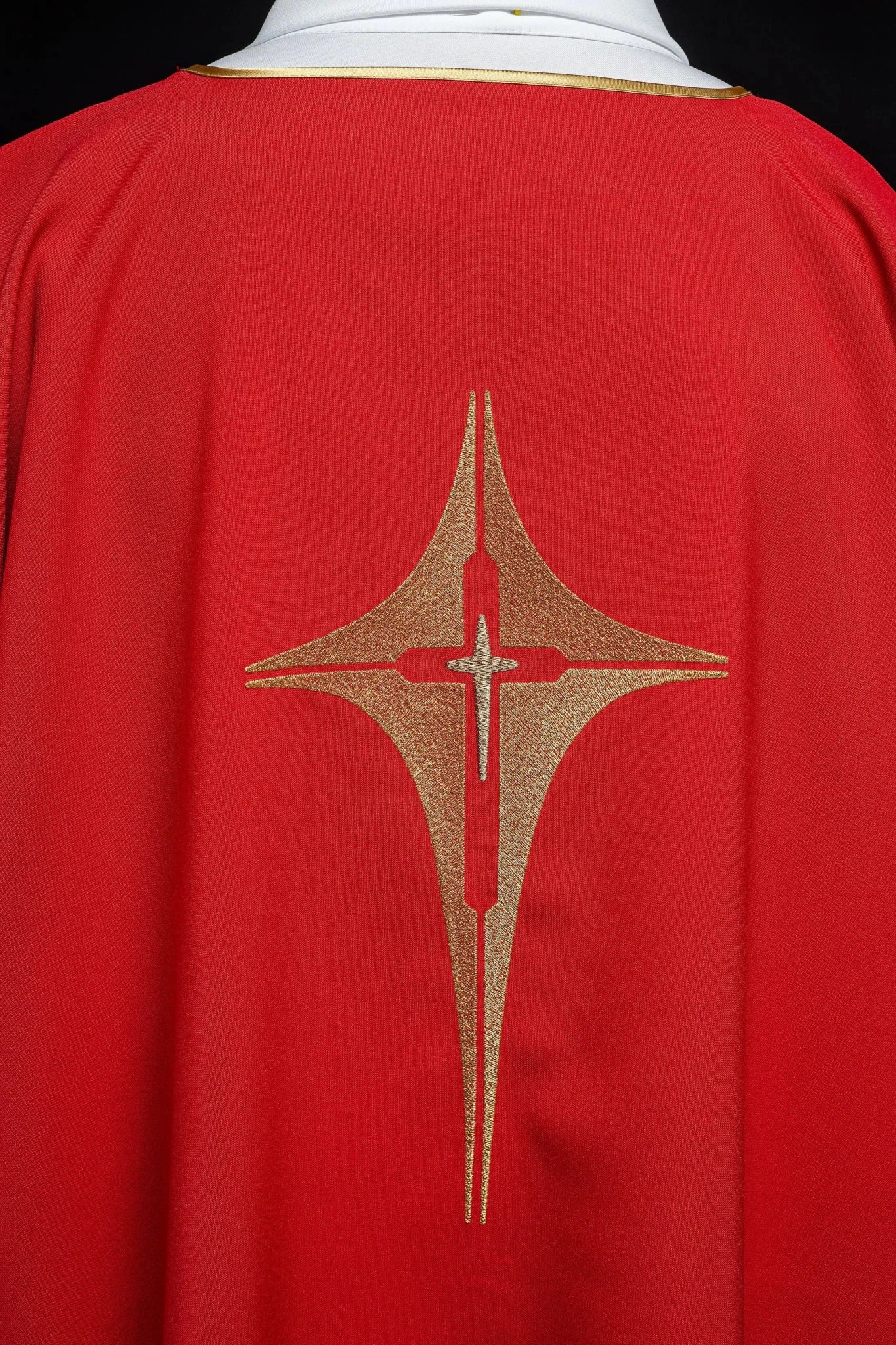 Red Dalmatia with embroidered gold cross