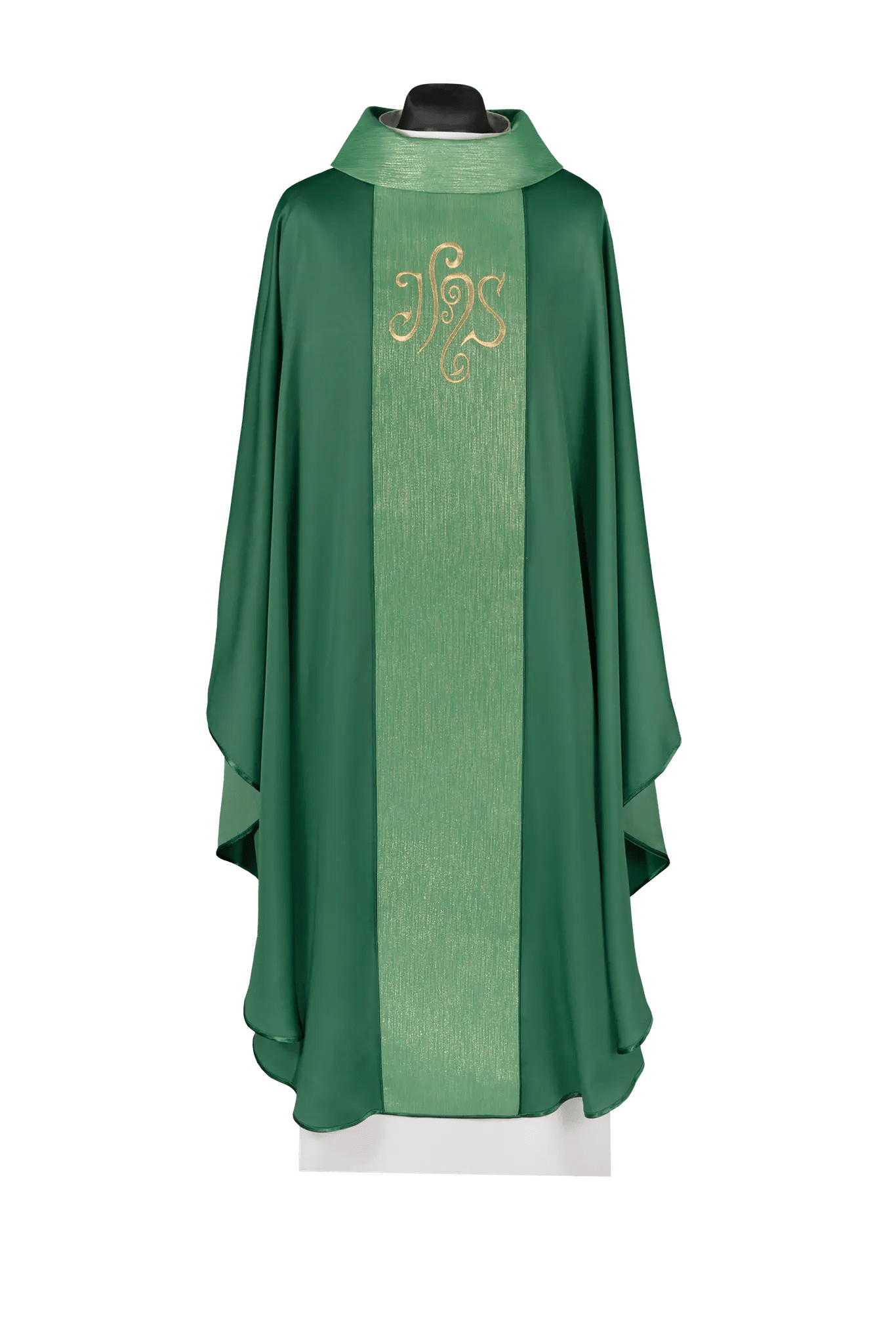 Green chasuble is decorated with a band and an embroidered IHS symbol