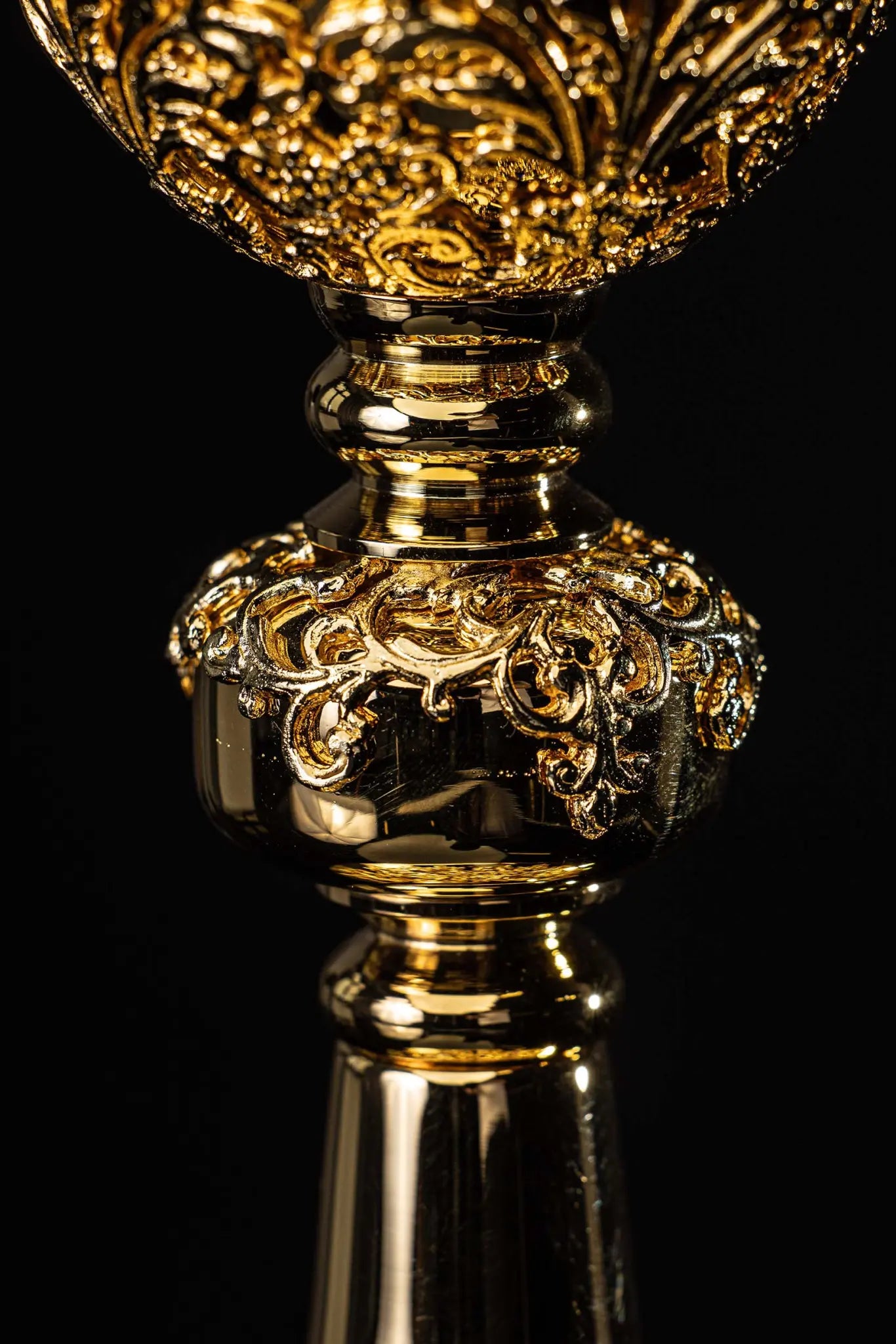 Handmade gold-plated chalice with floral ornamentation on the cup, knop, and base, adorned with blue imitation sapphires.