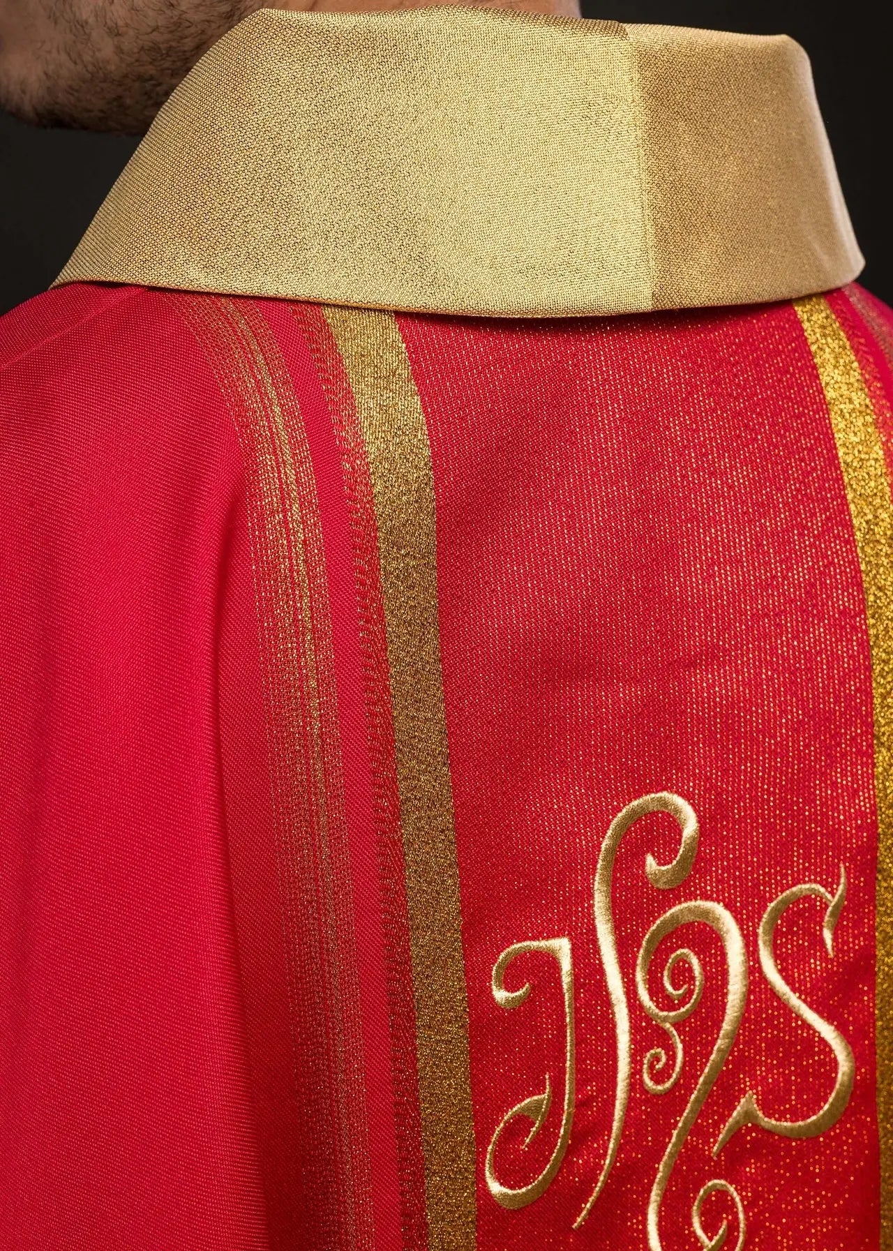 Red embroidered chasuble with IHS design with gilding