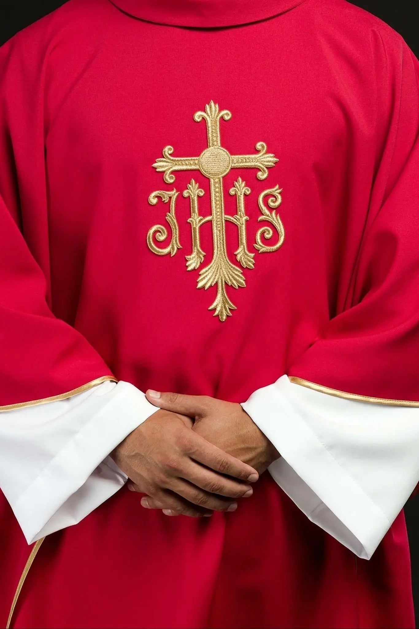 Embroidered red chasuble with JHS symbol