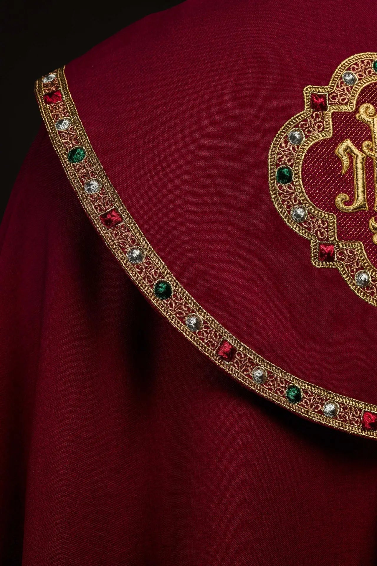 Red liturgical cape with gold IHS