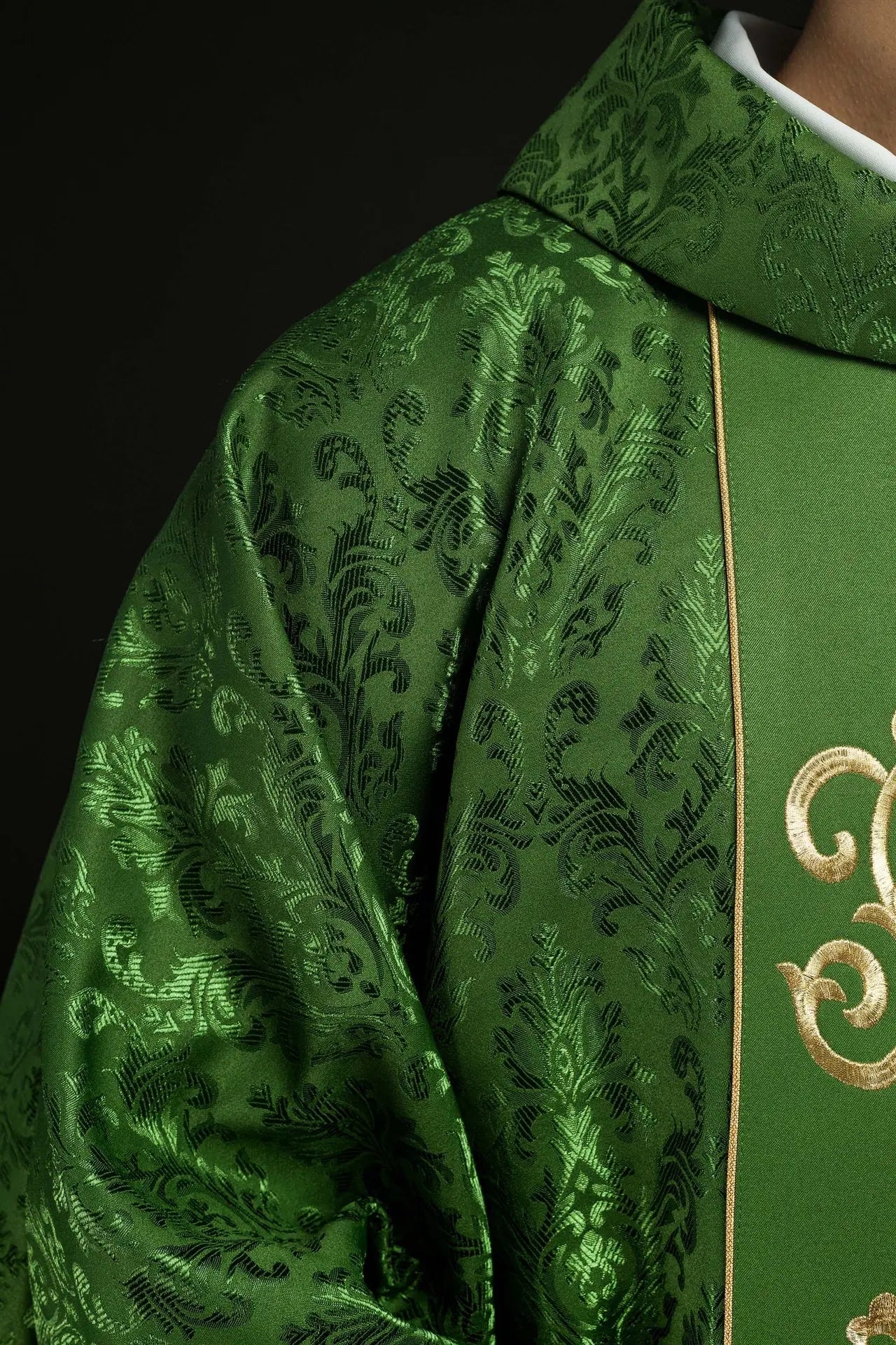 Green liturgical chasuble with richly decorated IHS belt