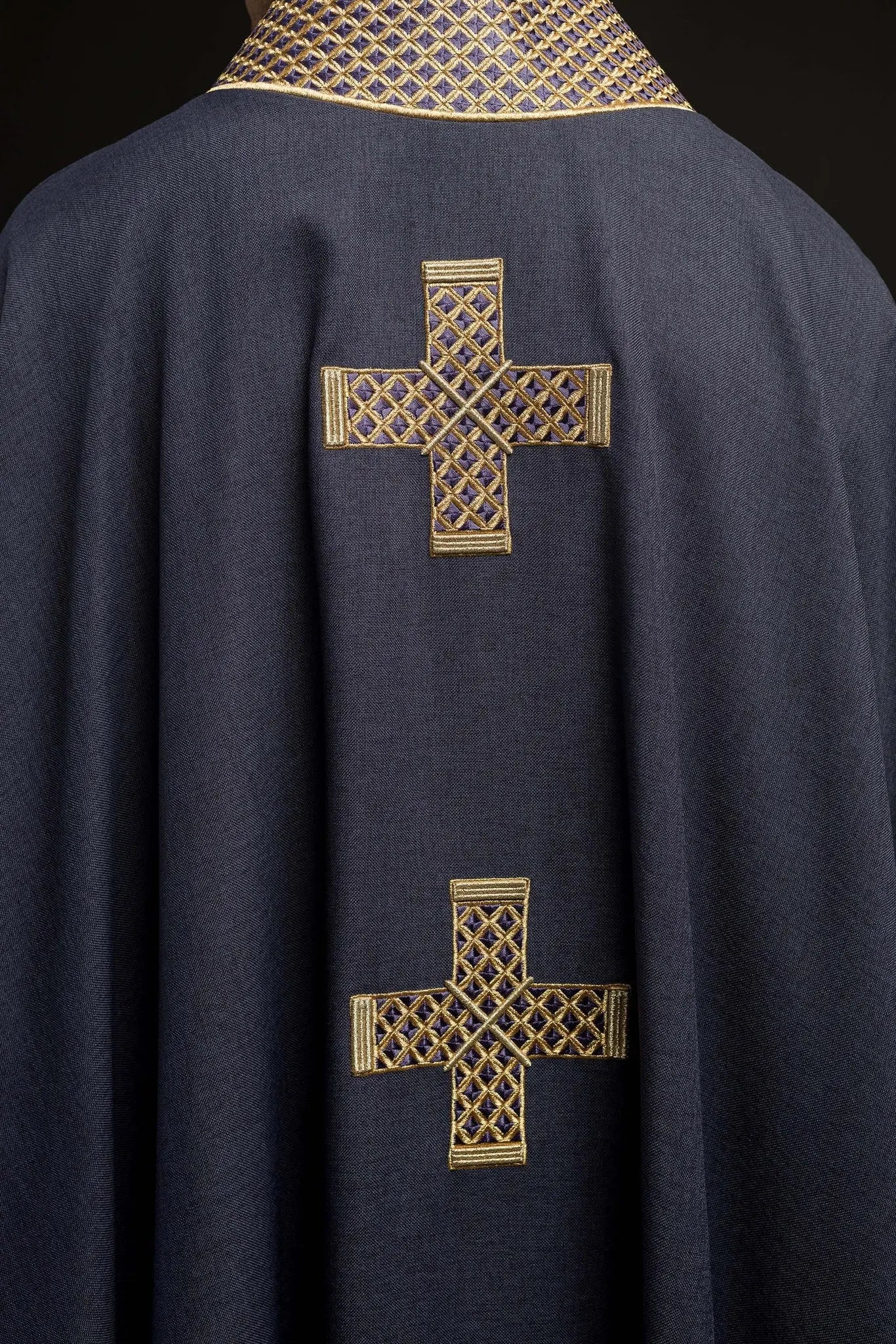 Purple chasuble with embroidered crosses and collar