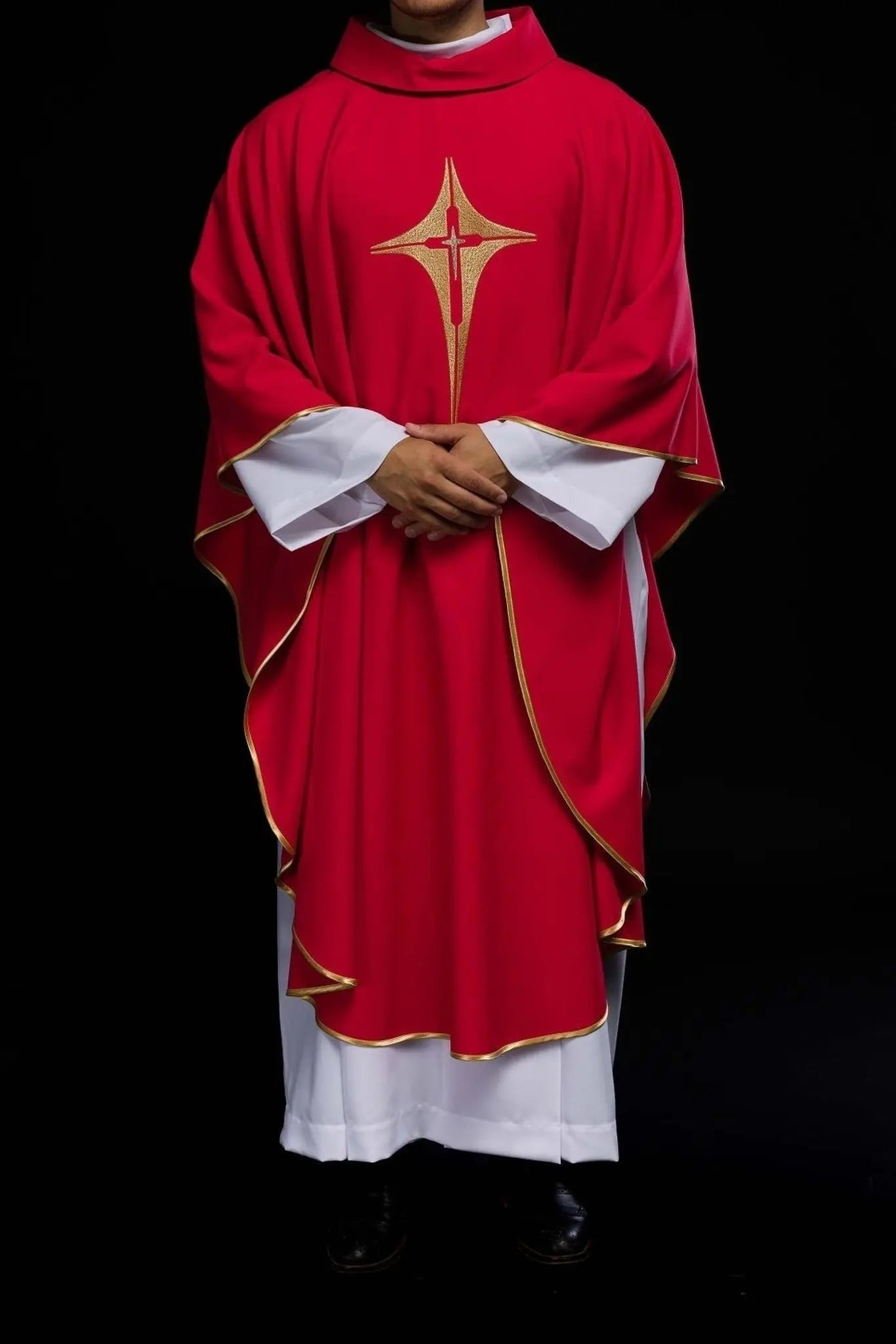 Red chasuble embroidered with cross motif