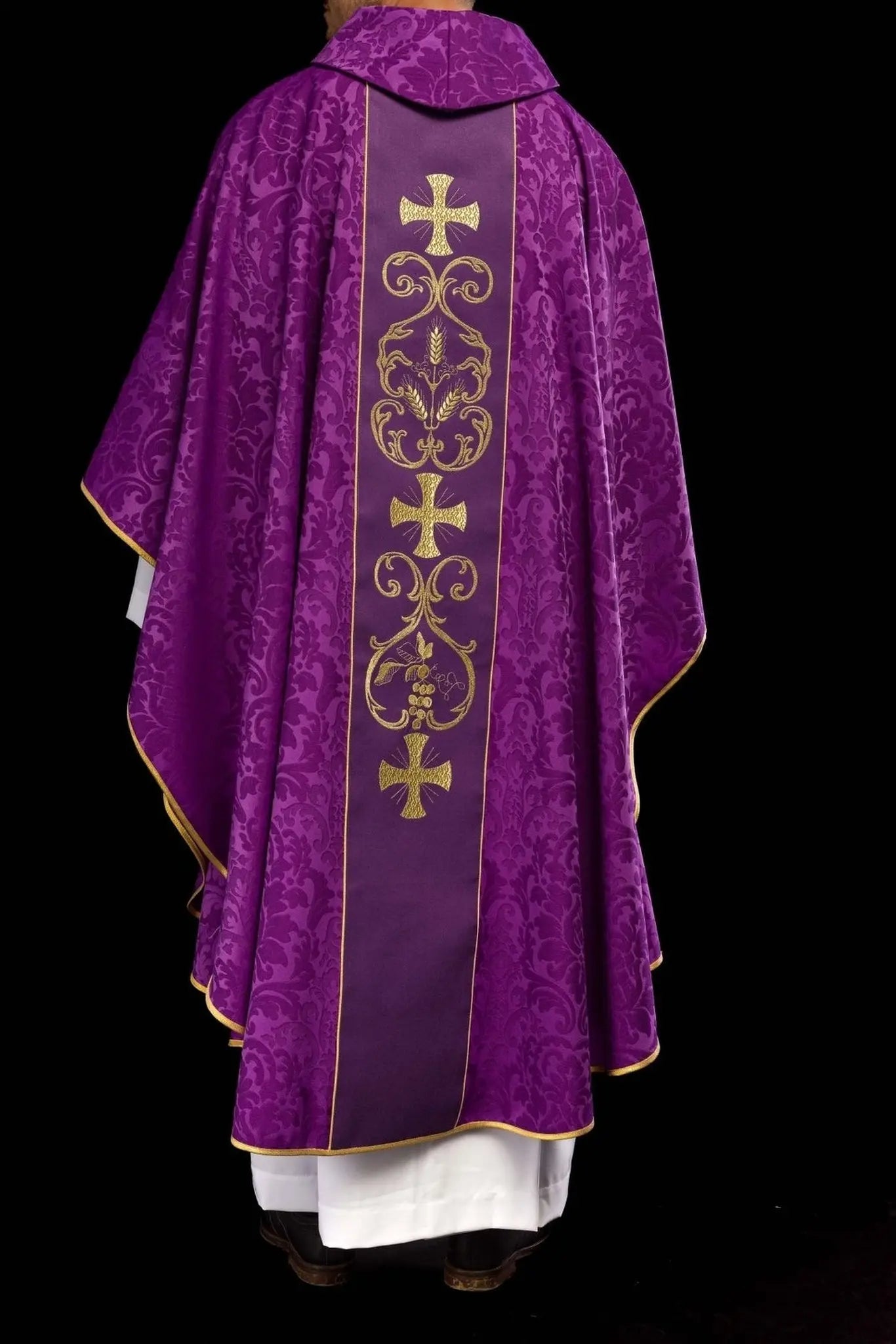 Purple liturgical chasuble decorated with embroidered belt