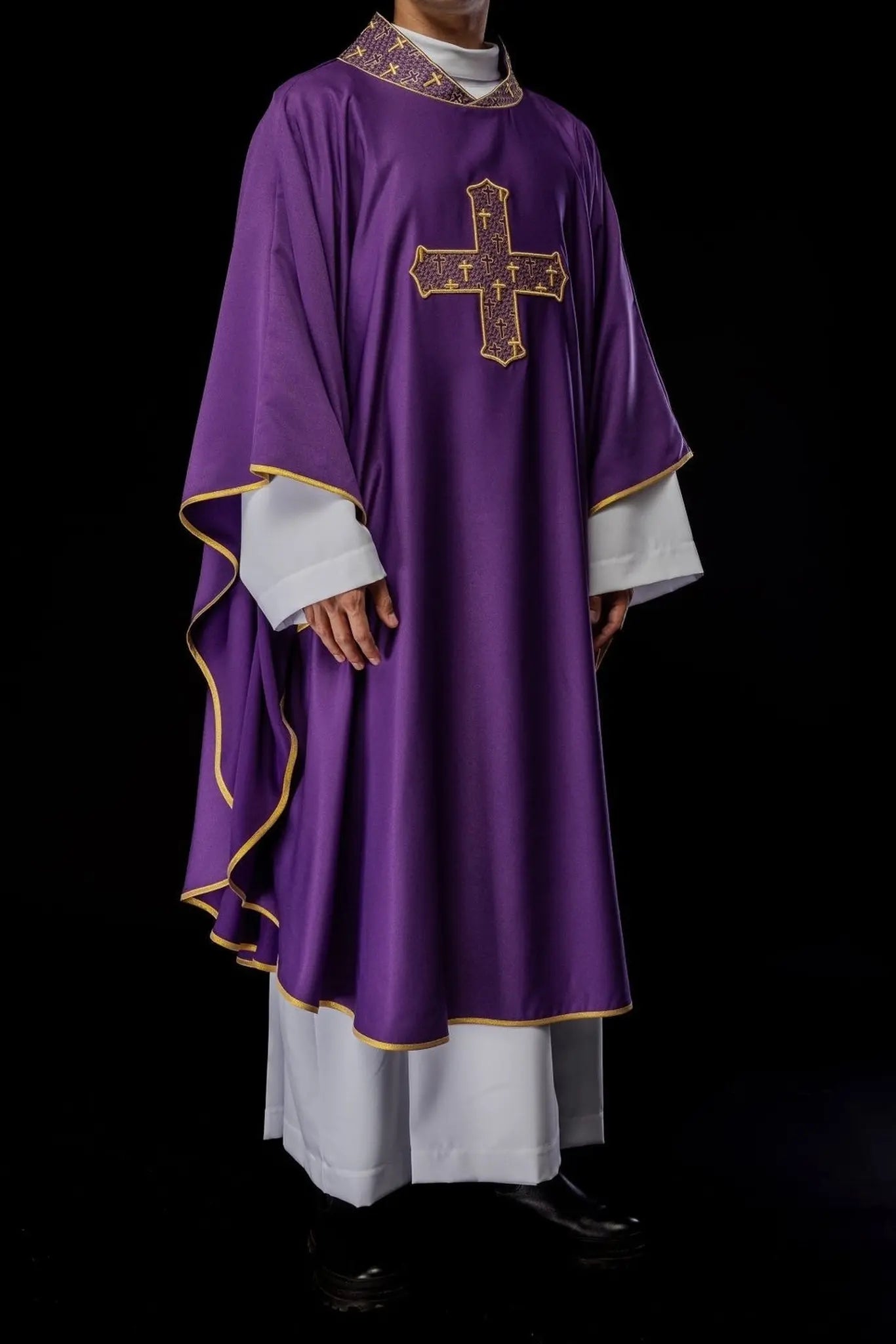 Chasuble with richly embroidered cross and collar in purple