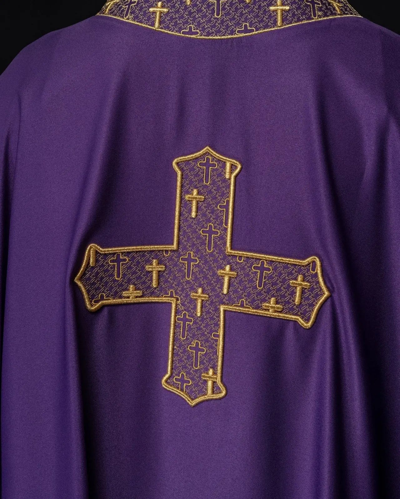 Chasuble with richly embroidered cross and collar in purple