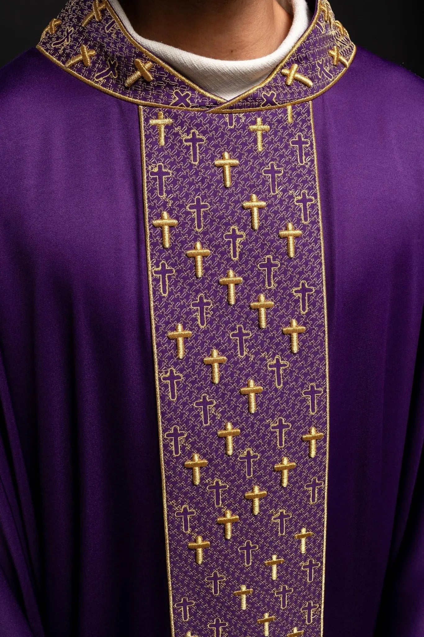 Chasuble with richly embroidered belt with crosses in purple color
