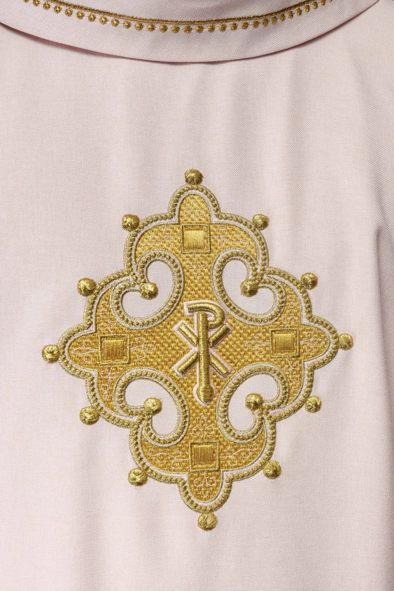 Chasuble with embroidered cross and gold trim on collar in rose color