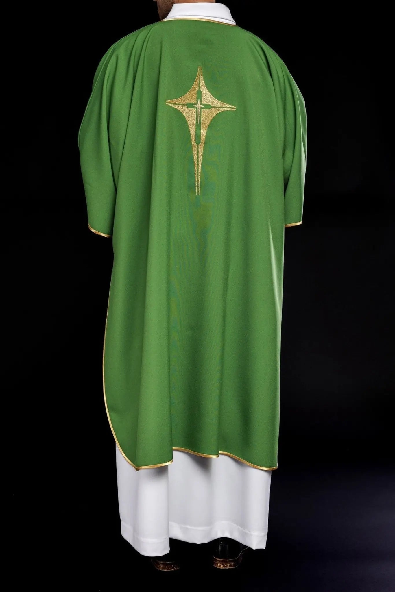 Green Dalmatian with embroidered gold cross