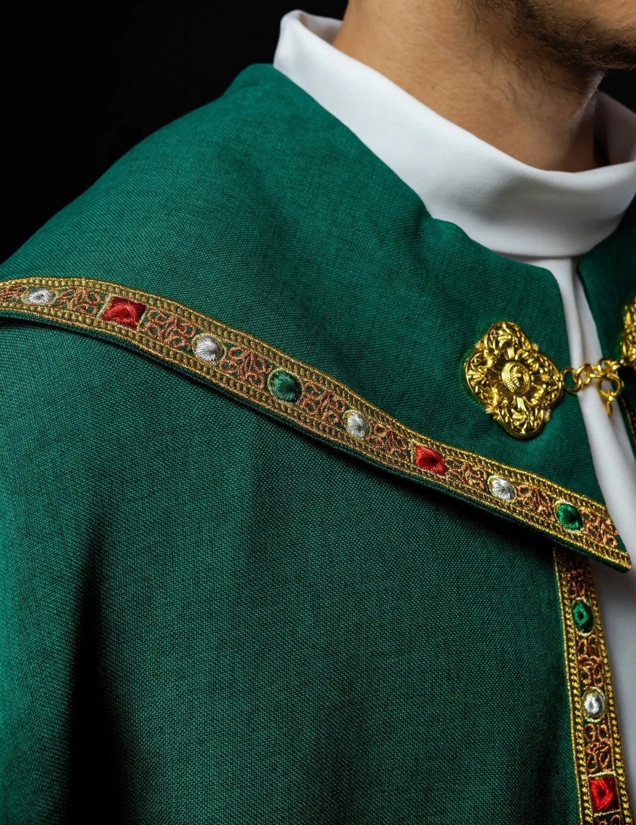 Green liturgical cape with gold IHS