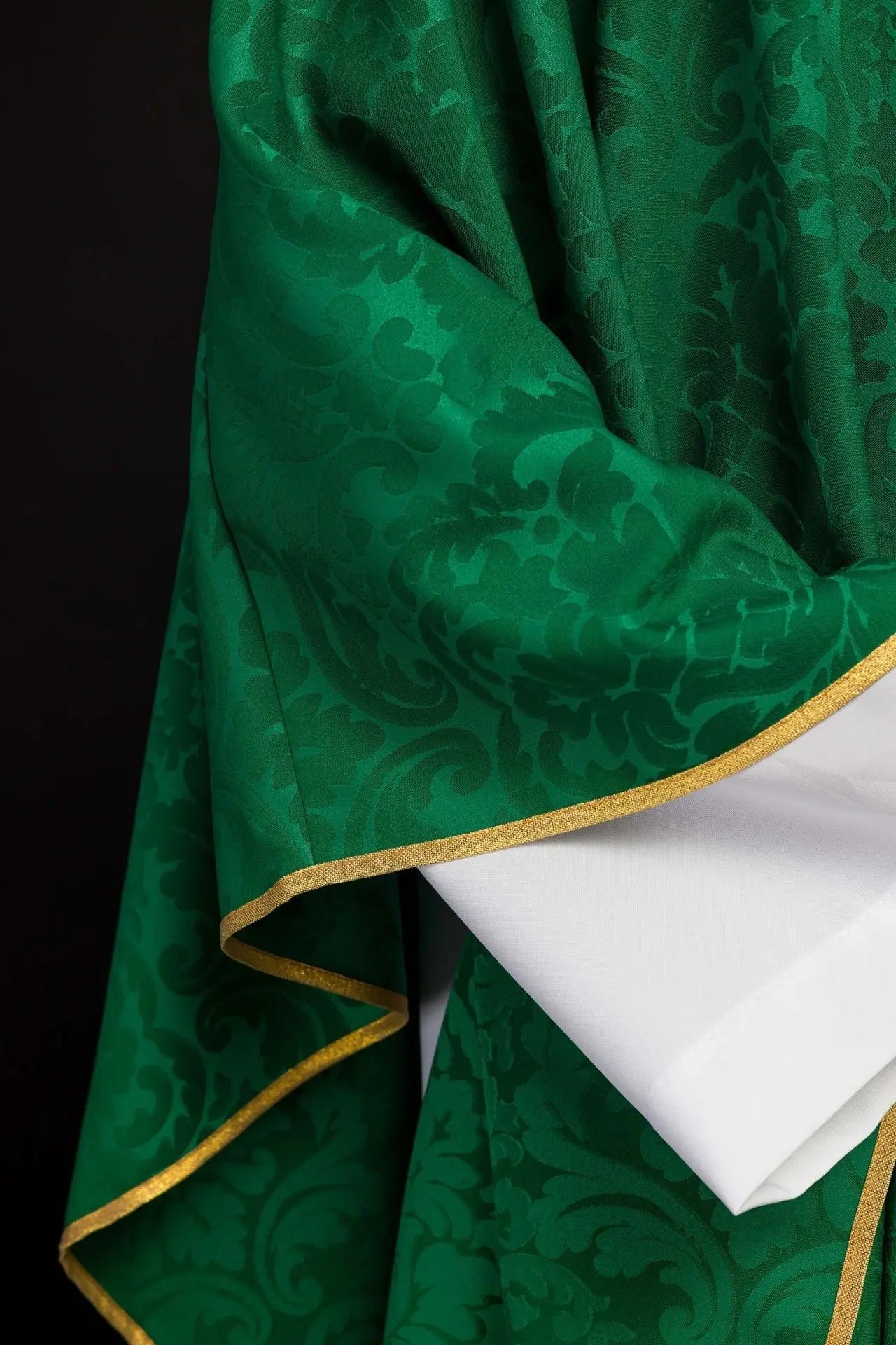 Green liturgical chasuble decorated with embroidered belt