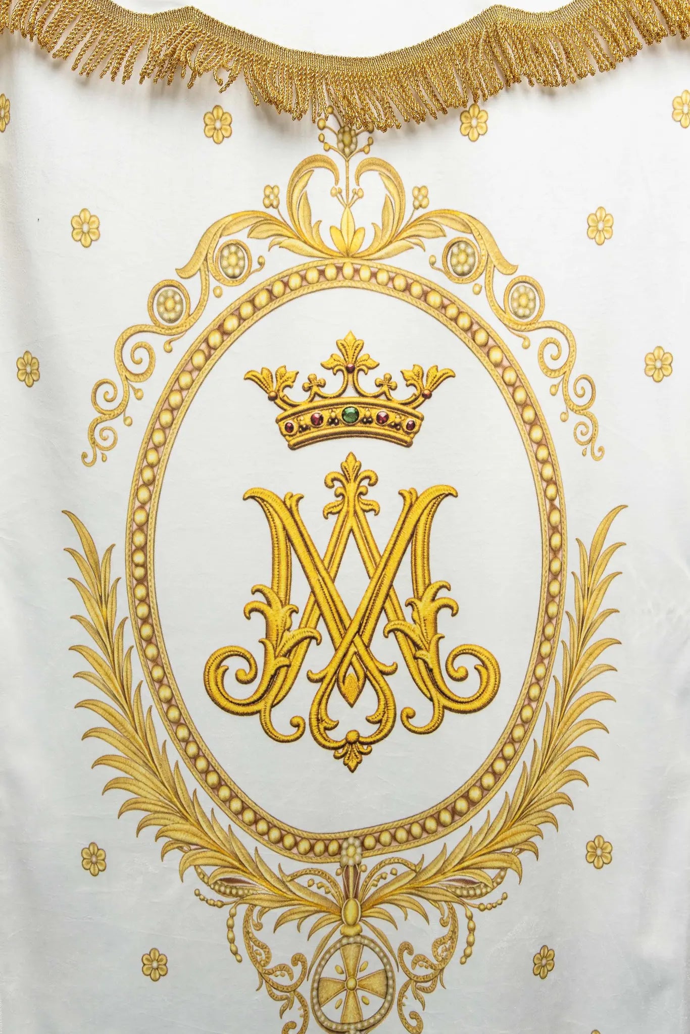 Double-sided processional banner with Our Lady of the Assumption on one side and a Marian monogram on the other, made of velour fabric with gold ornaments and fringes.
