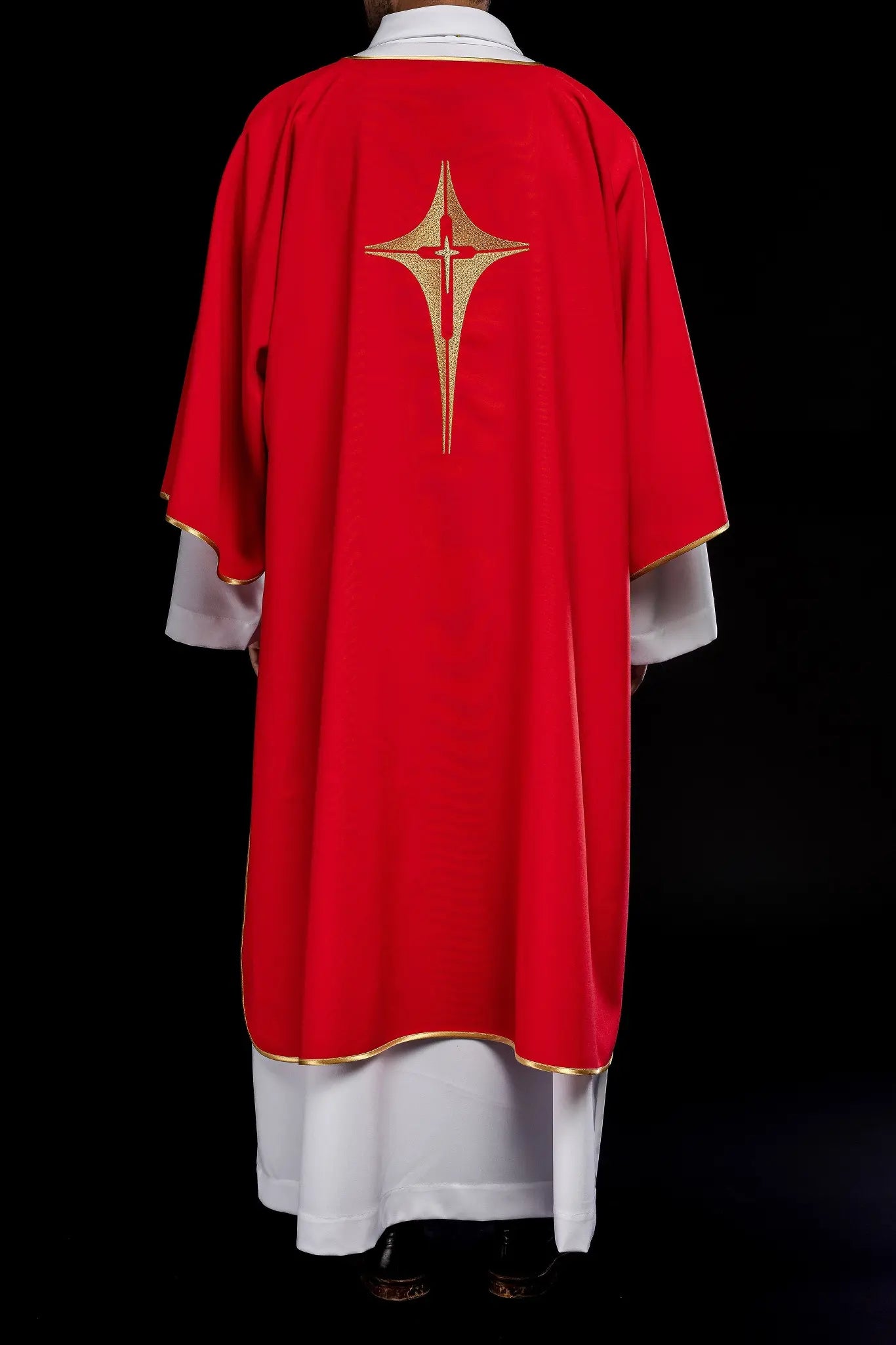 Red Dalmatia with embroidered gold cross