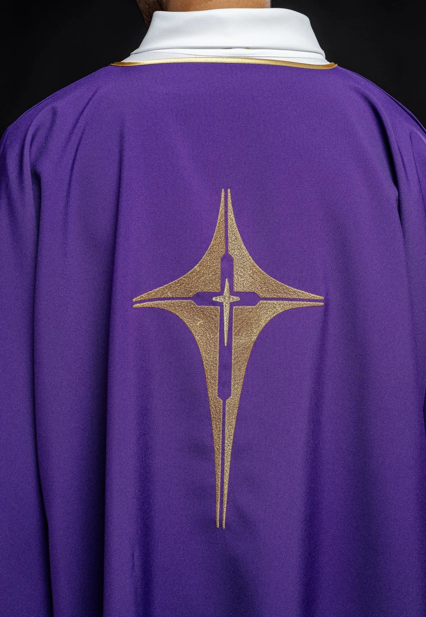 Purple Dalmatian with embroidered gold cross