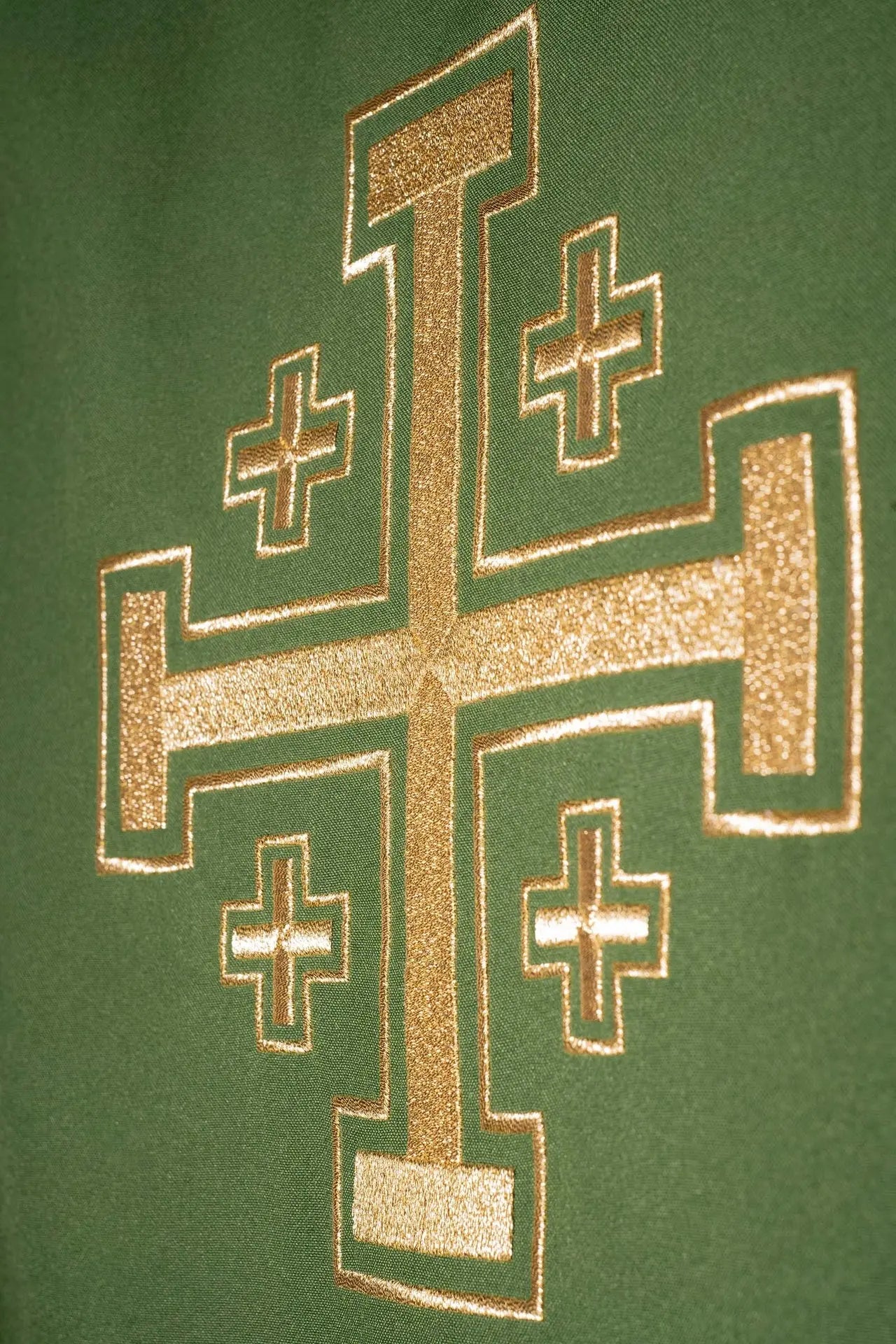 Green chasuble embroidered with cross motif