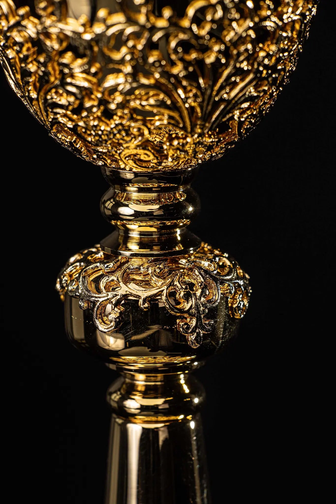 Handmade gold-plated chalice with floral ornamentation on the cup, knop, and base, adorned with blue imitation sapphires.