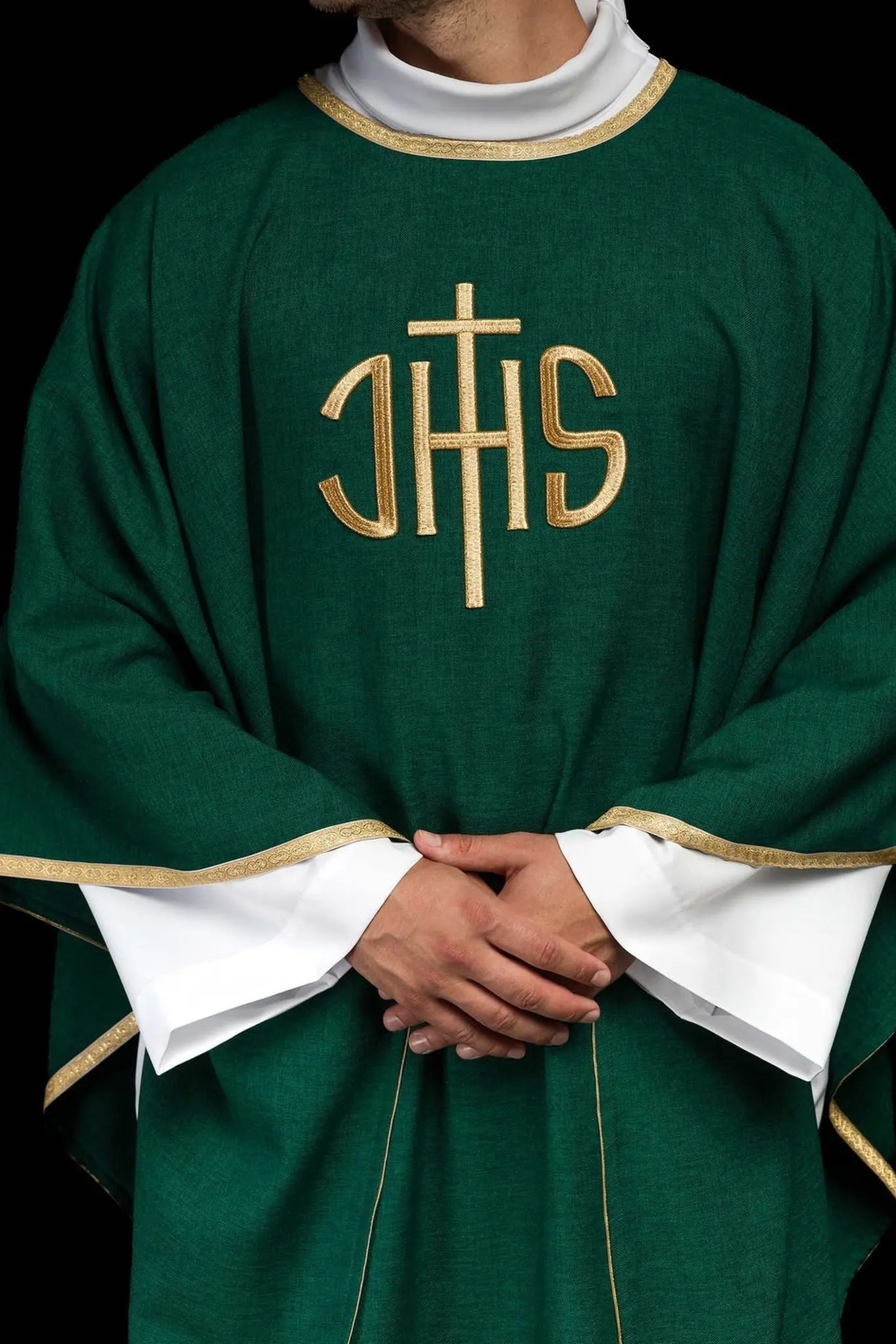 Green liturgical chasuble with a gold IHS embroidery