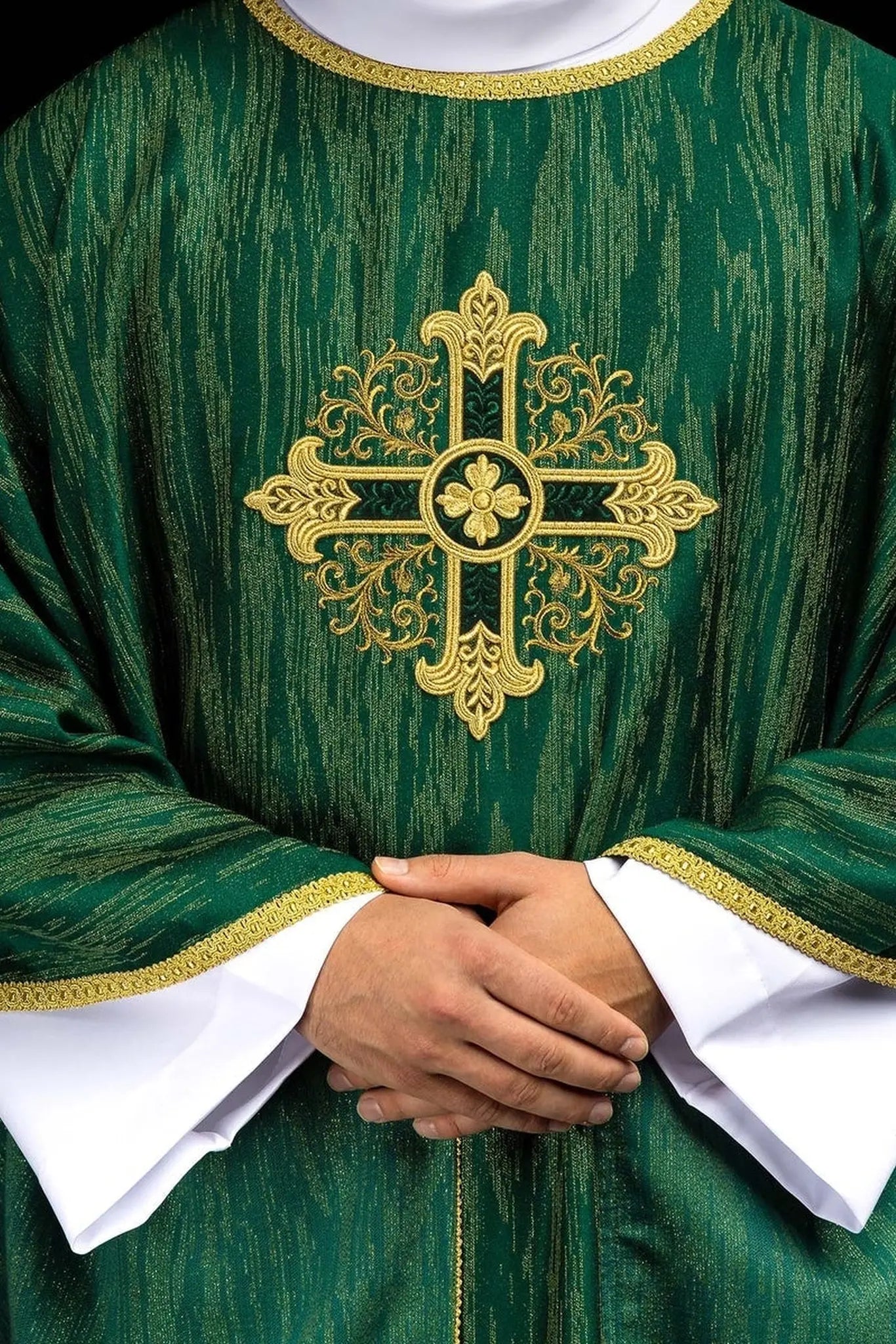 Green chasuble with an embroidered cross motif on decorative fabric