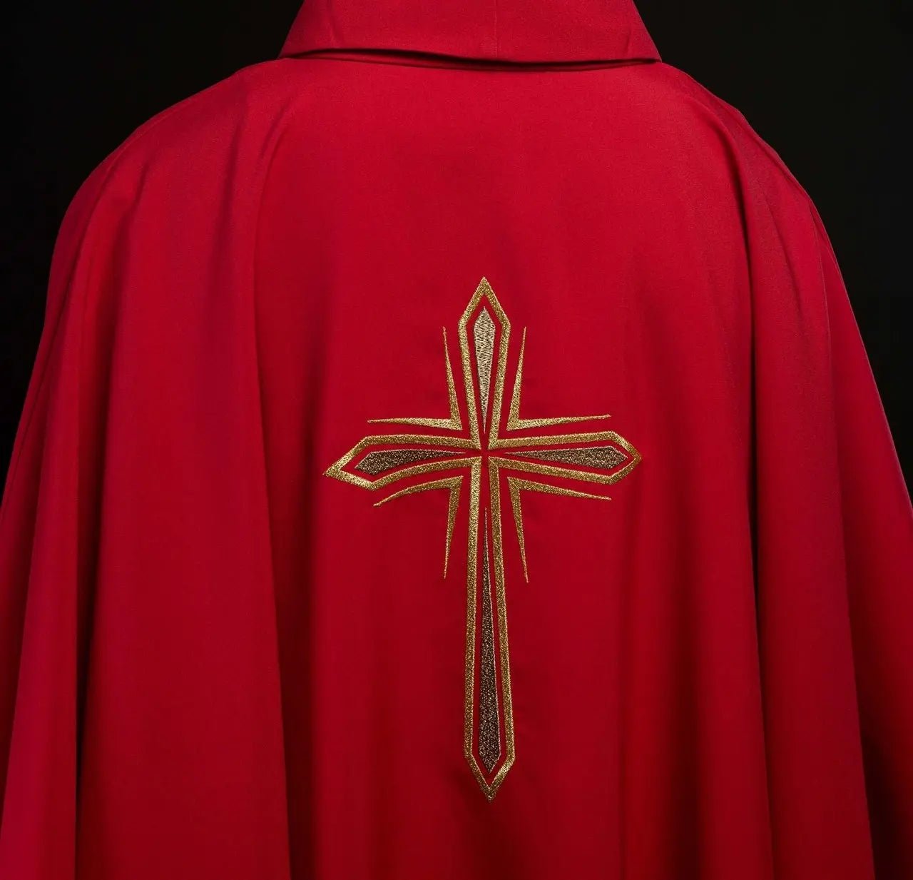 Red chasuble embroidered with cross design