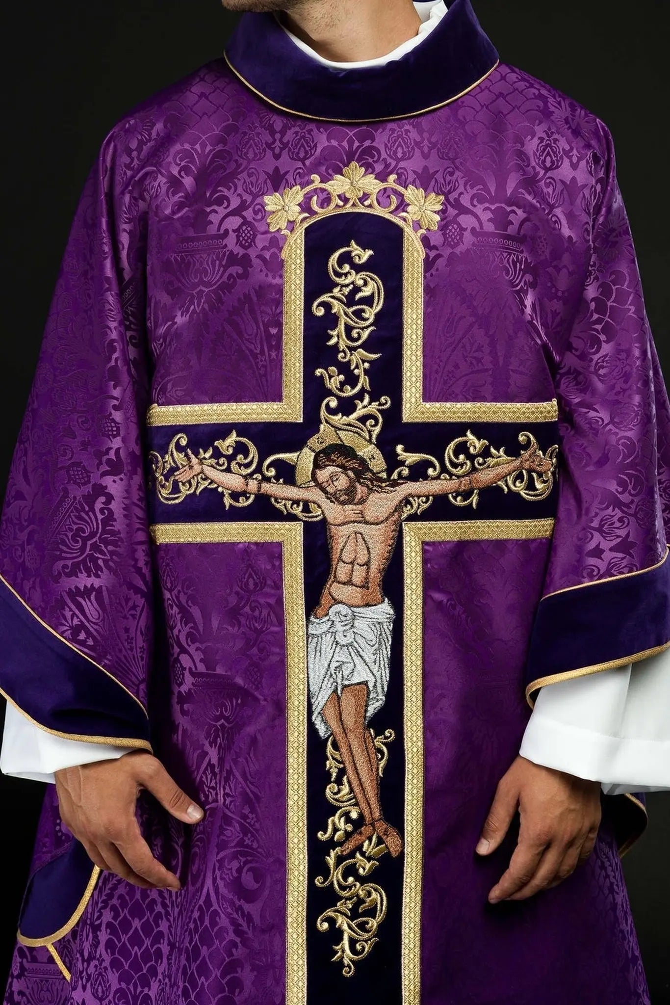 Purple chasuble embroidered with pattern of Jesus Christ