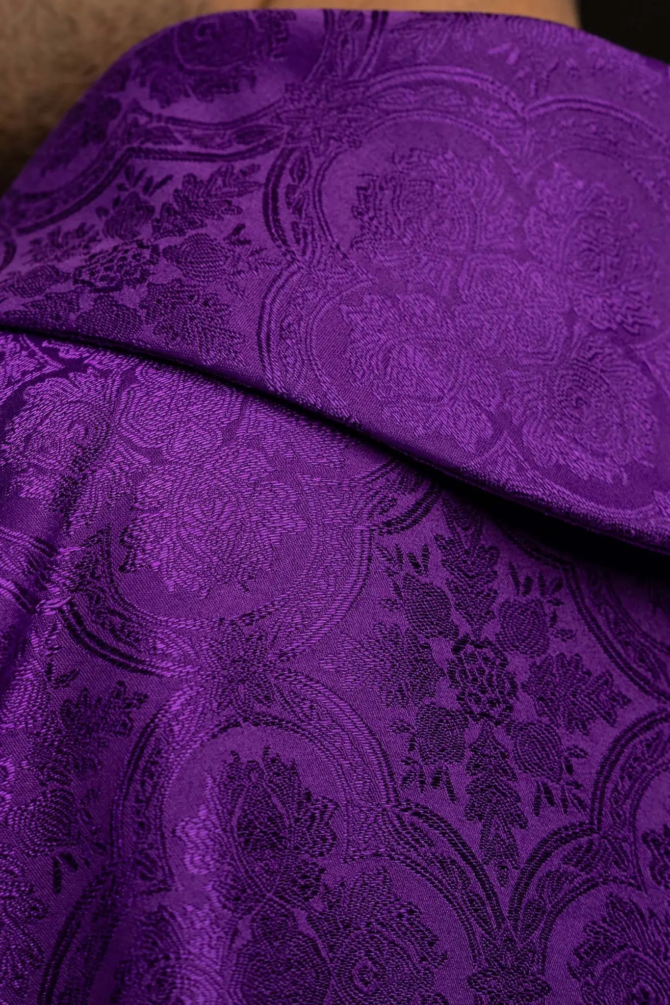 Purple chasuble with a gold embroidered cross on jacquard fabric, featuring a stand-up collar and gold trim.