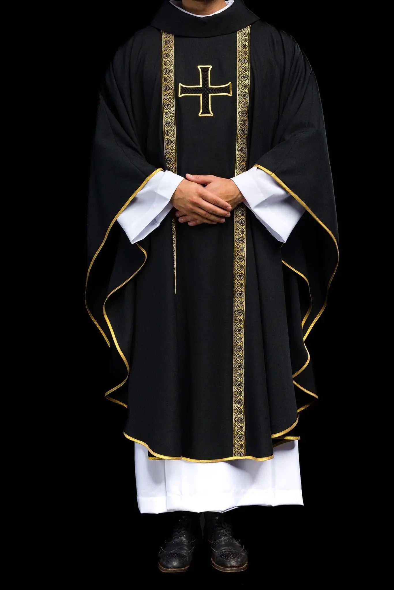 Black liturgical chasuble with embroidered cross and jacquard bands