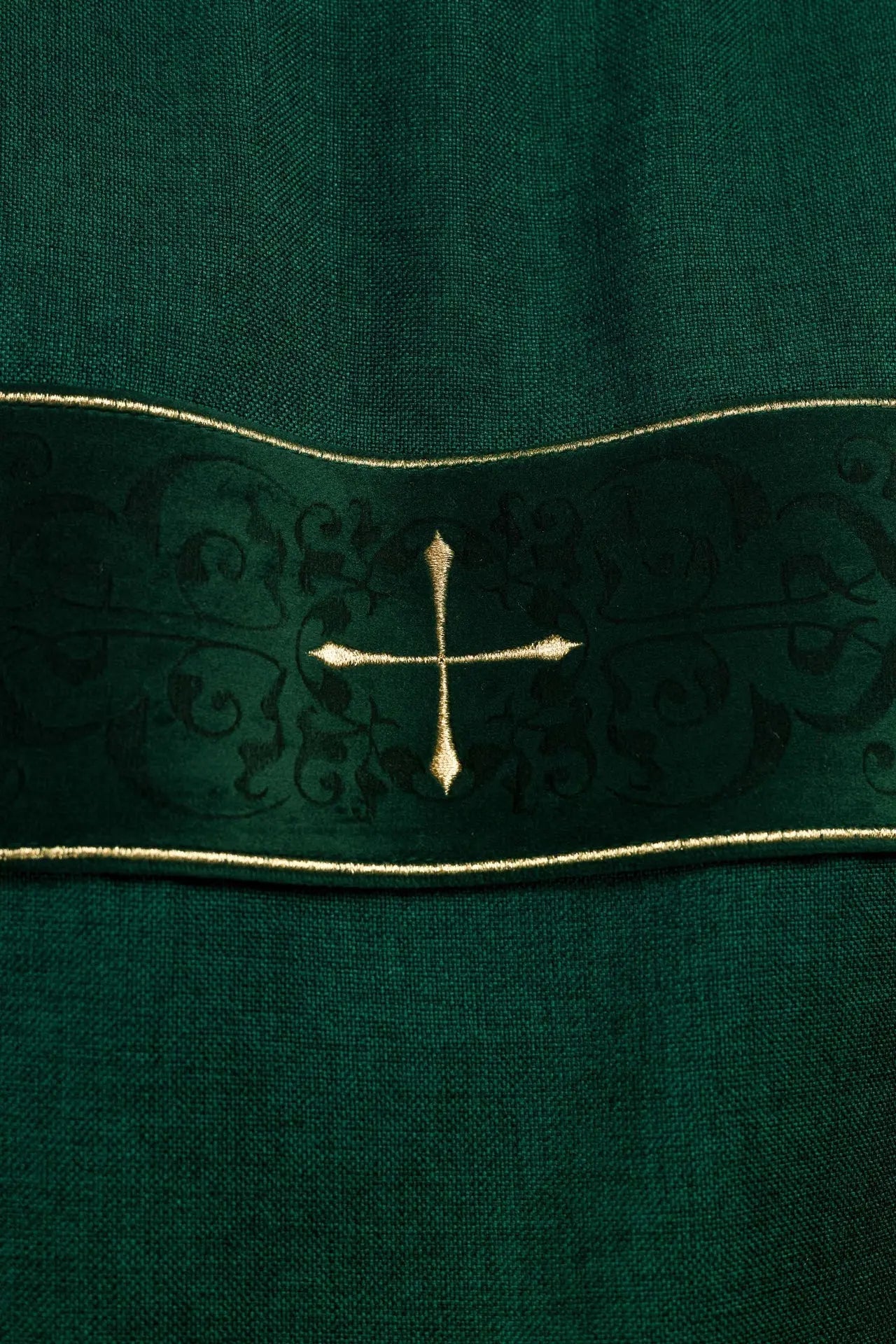 Green dalmatic with velvet stripes and embroidered gold crosses
