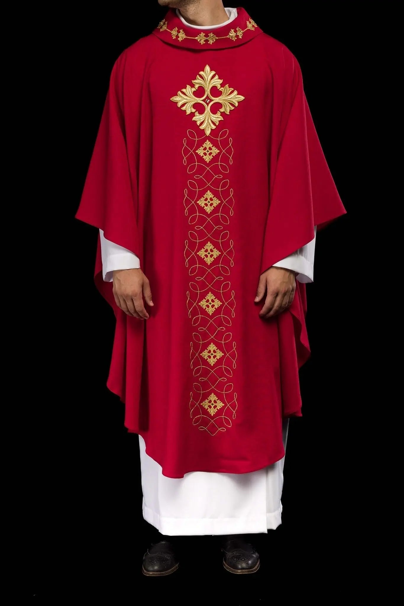 Red chasuble richly embroidered with rope and stones