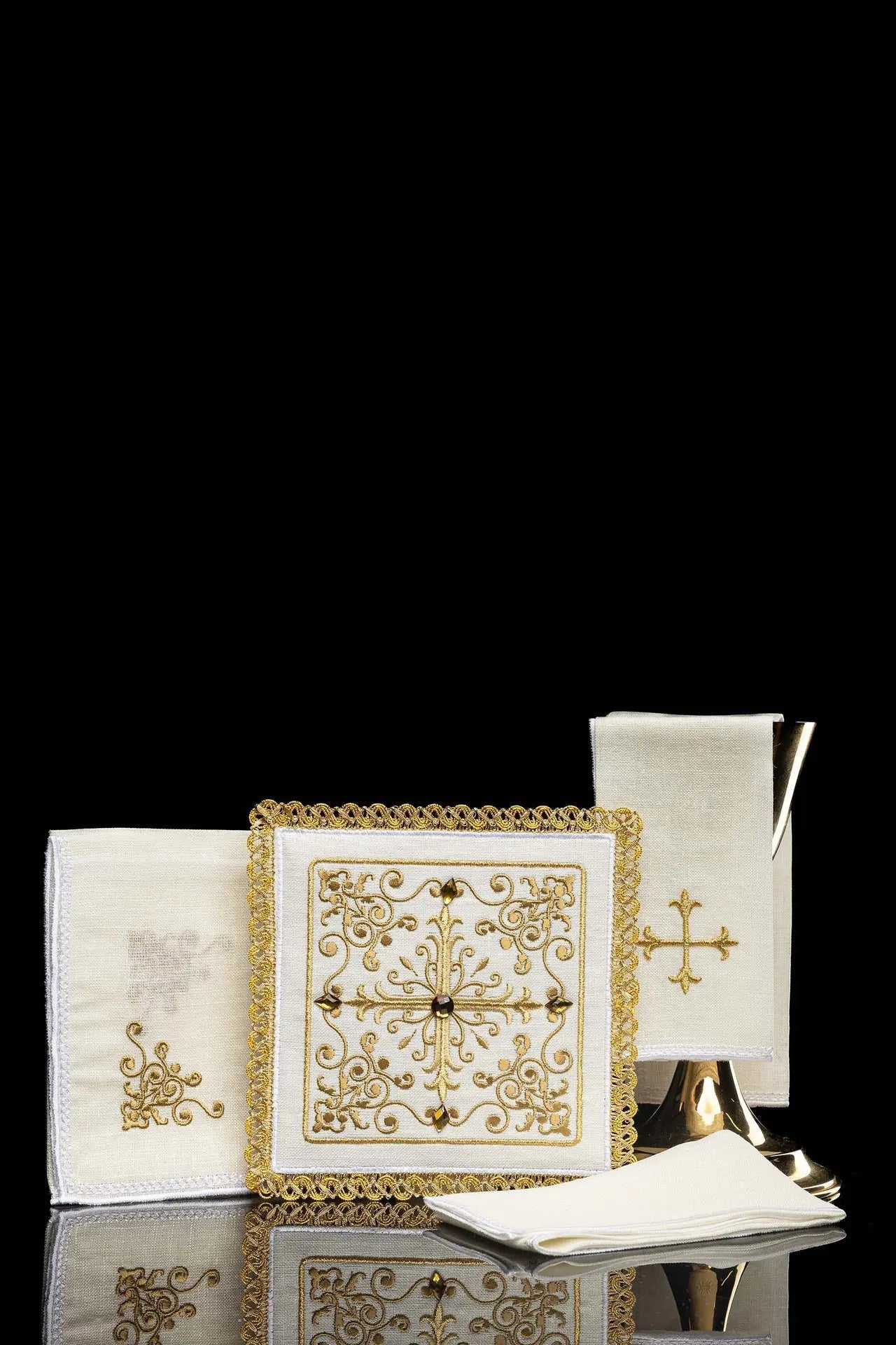 Richly decorated linen cup set with cross embroidery