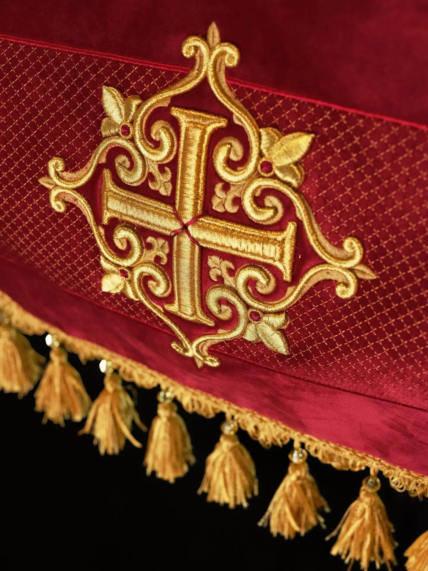 Embroidered canopy on burgundy velvet
