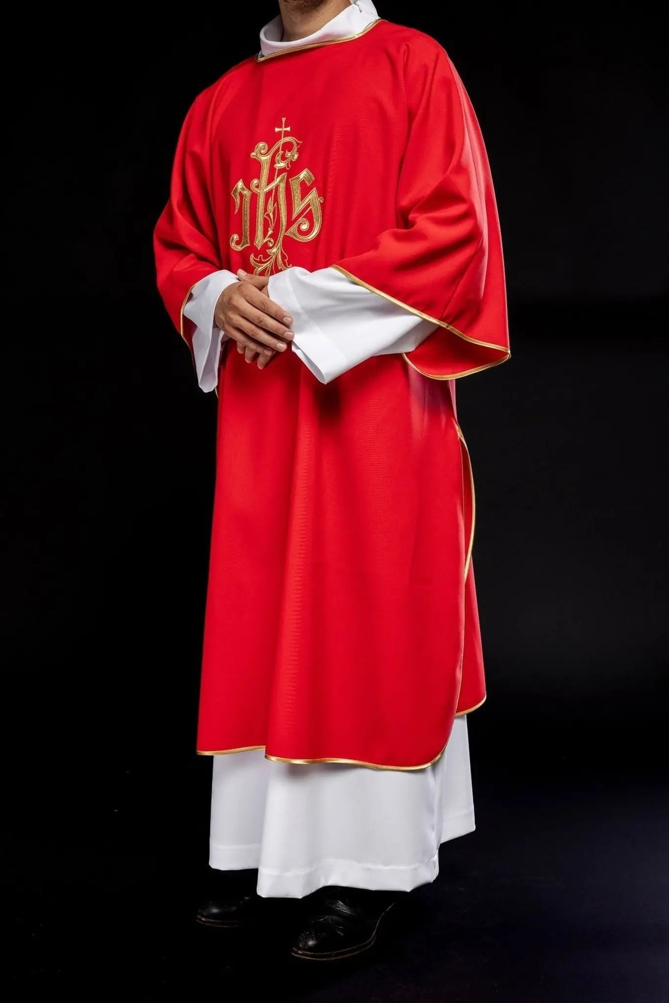 Red dalmatic with embroidered IHS design
