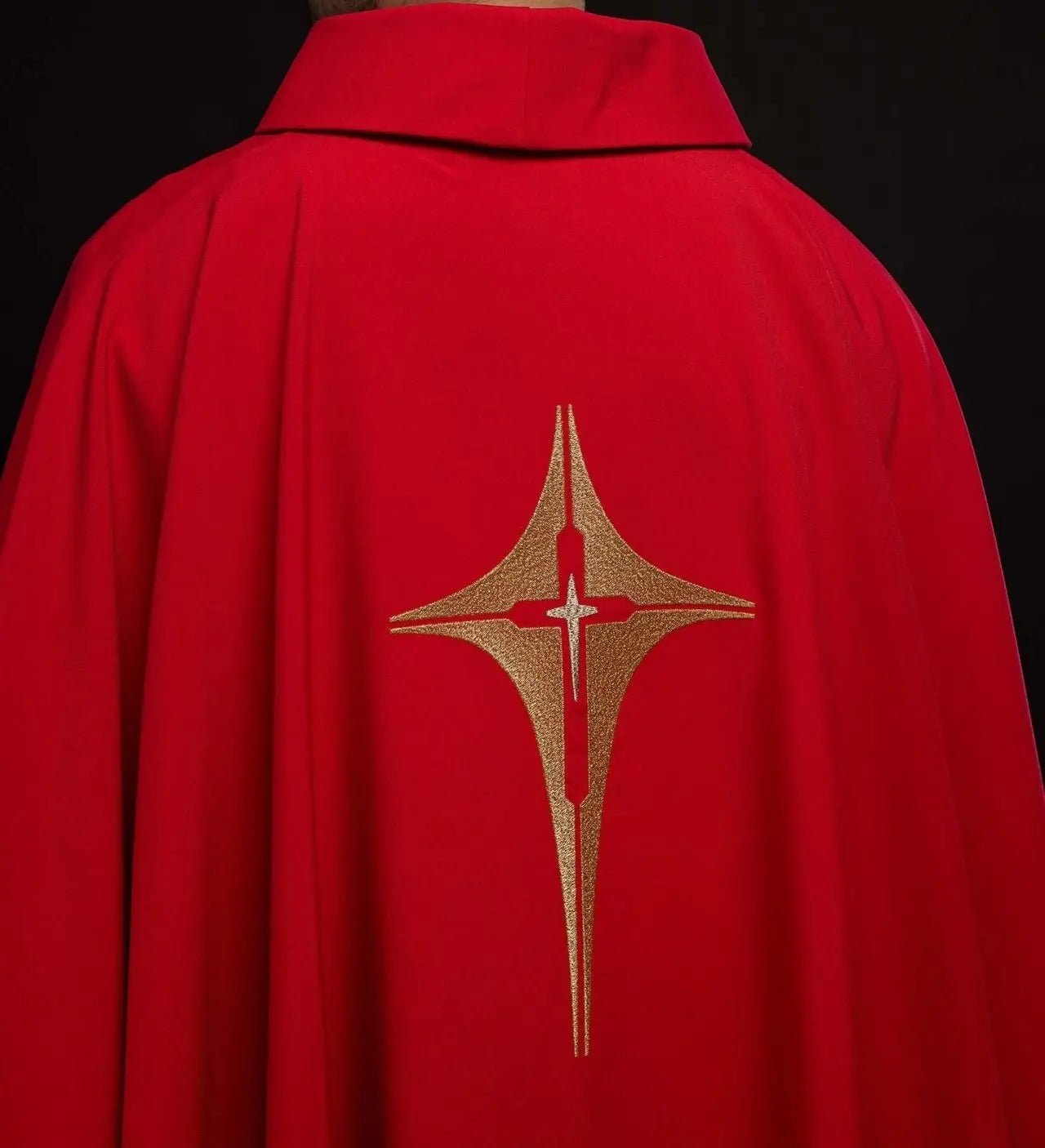 Red chasuble embroidered with cross motif