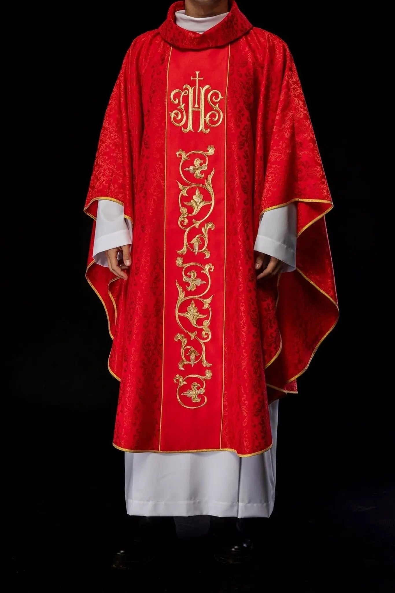 Red liturgical chasuble with richly decorated IHS belt