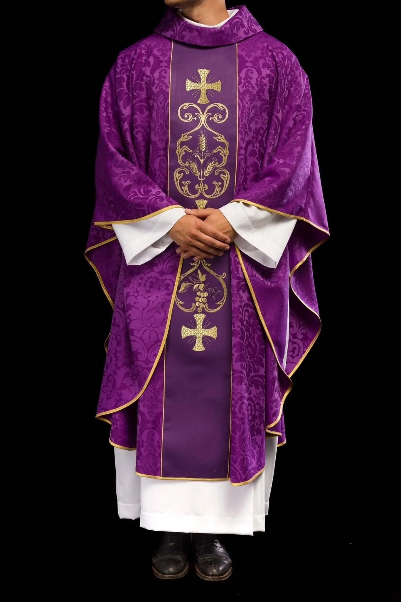 Purple liturgical chasuble decorated with embroidered belt