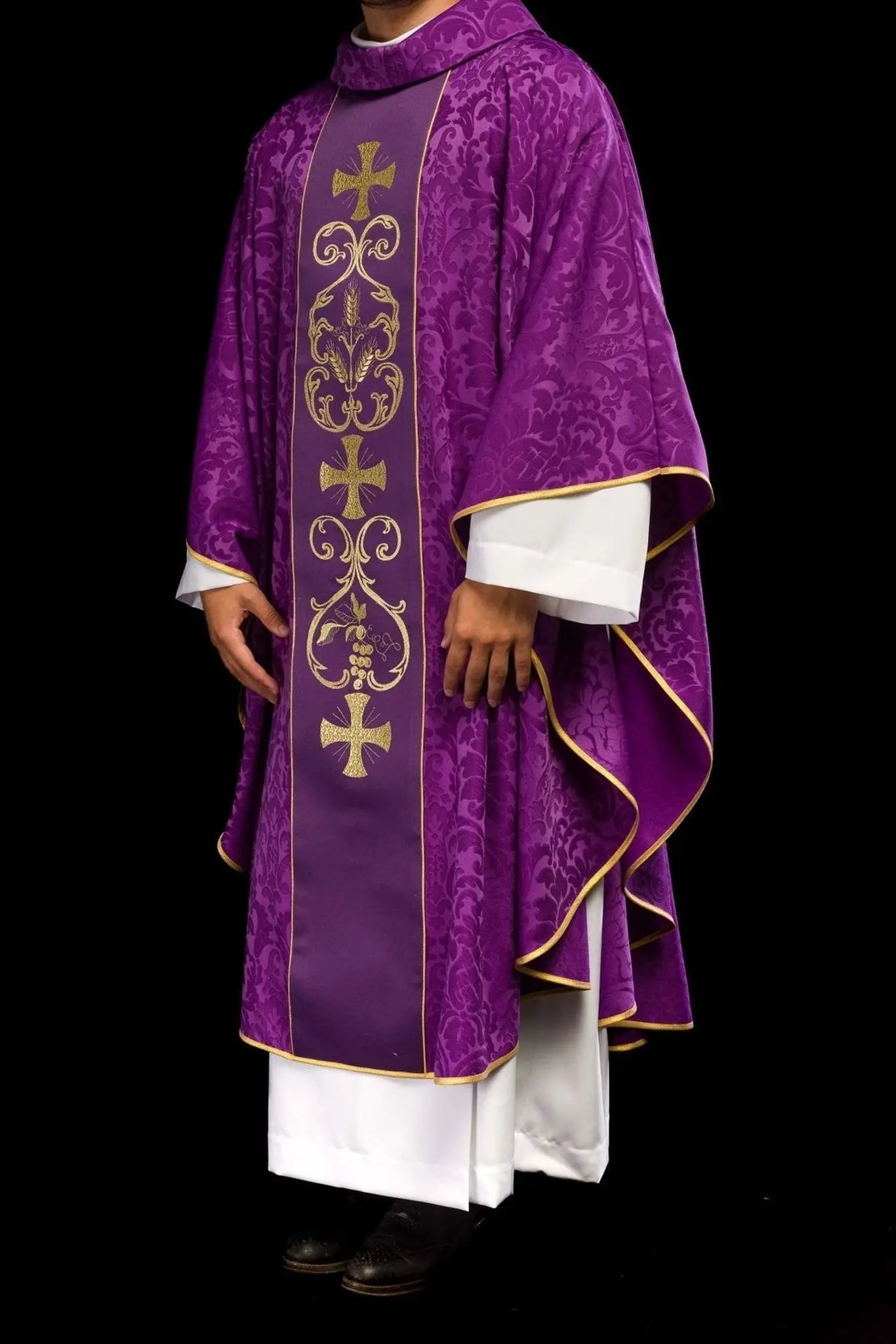 Purple liturgical chasuble decorated with embroidered belt