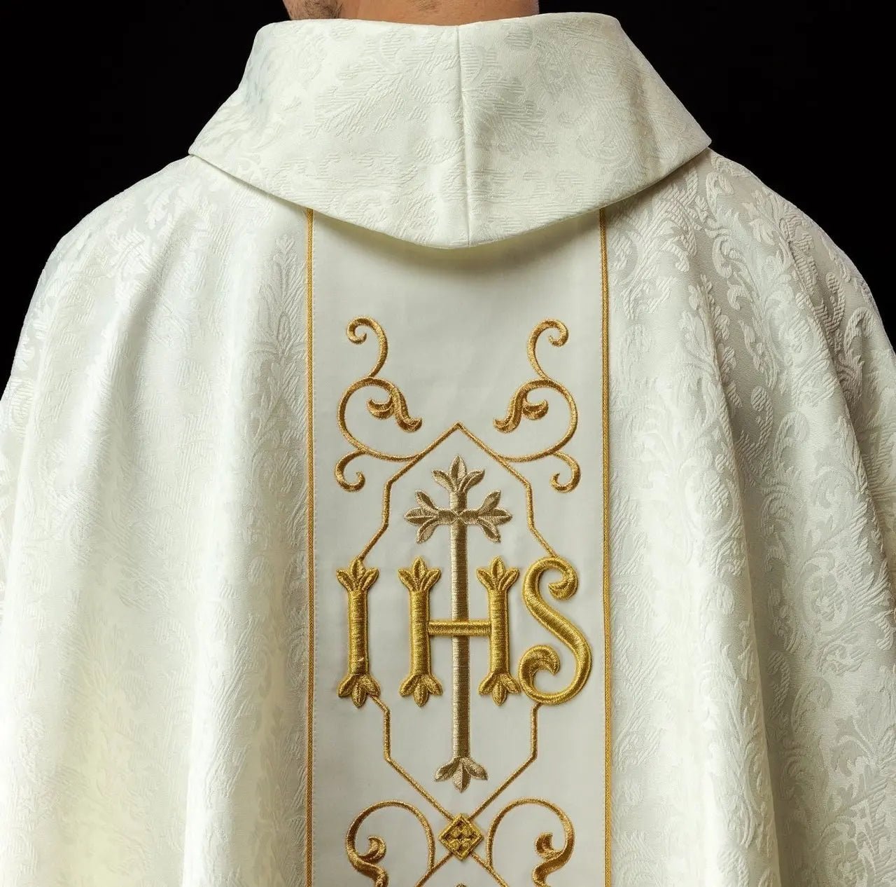 Ecru chasuble embroidered on decorative fabric with IHS symbol