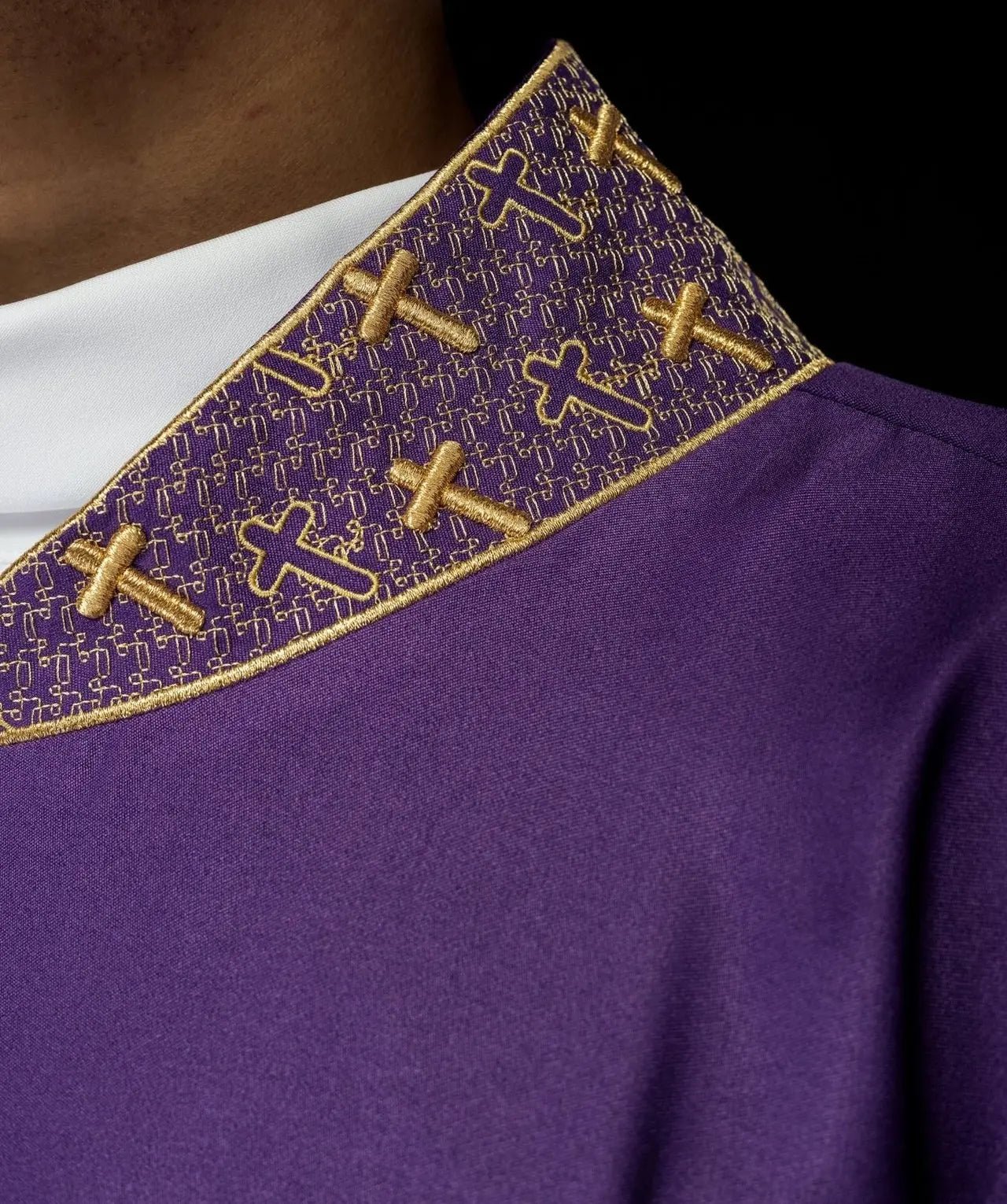Chasuble with richly embroidered cross and collar in purple