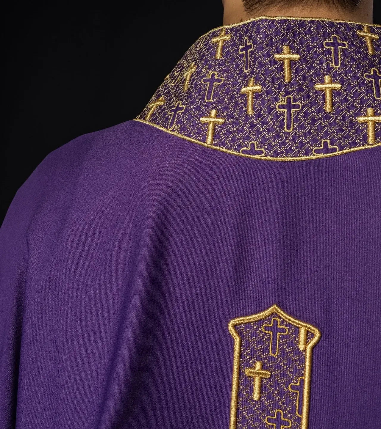 Chasuble with richly embroidered cross and collar in purple