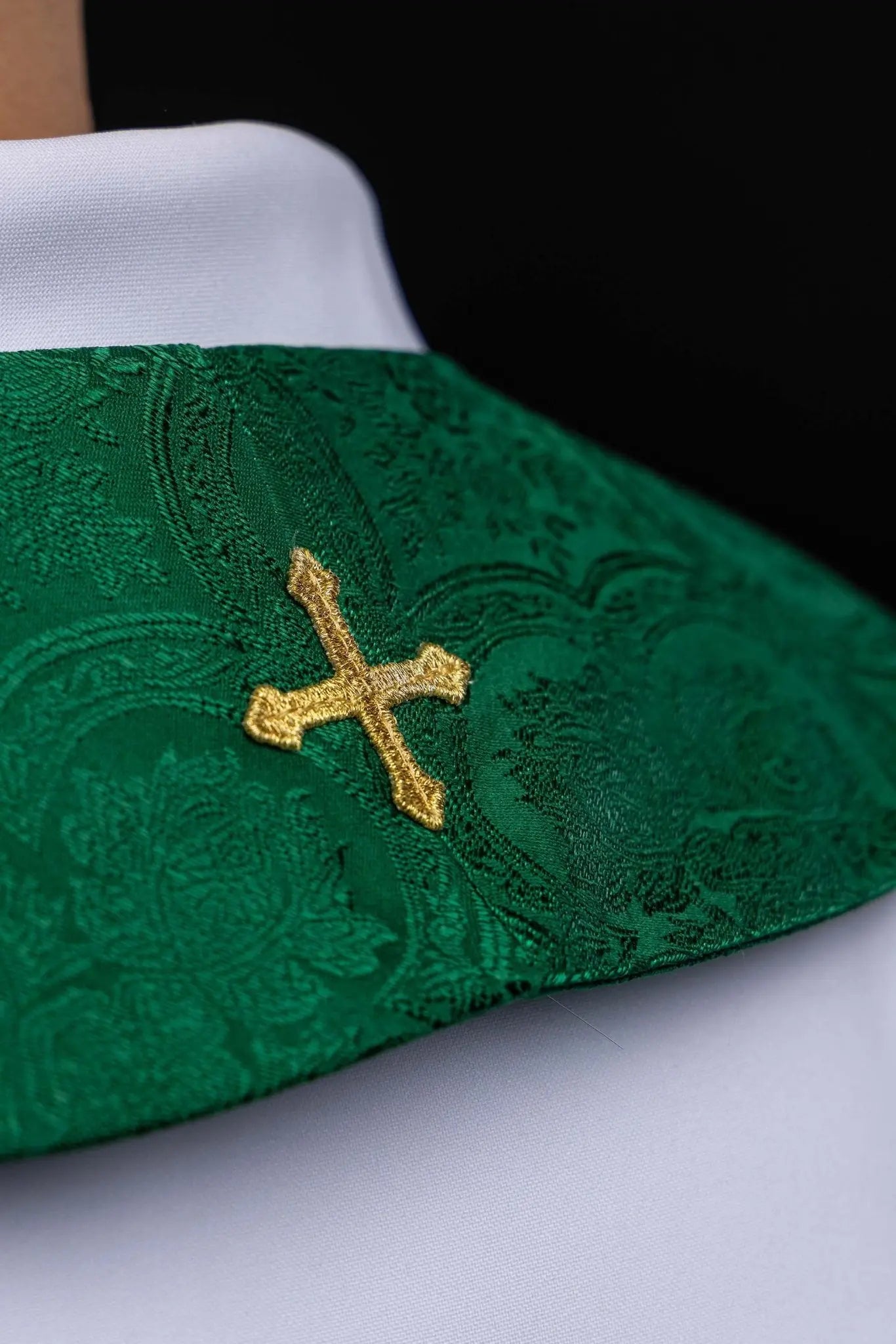 Green jacquard stole with embroidered cross motif