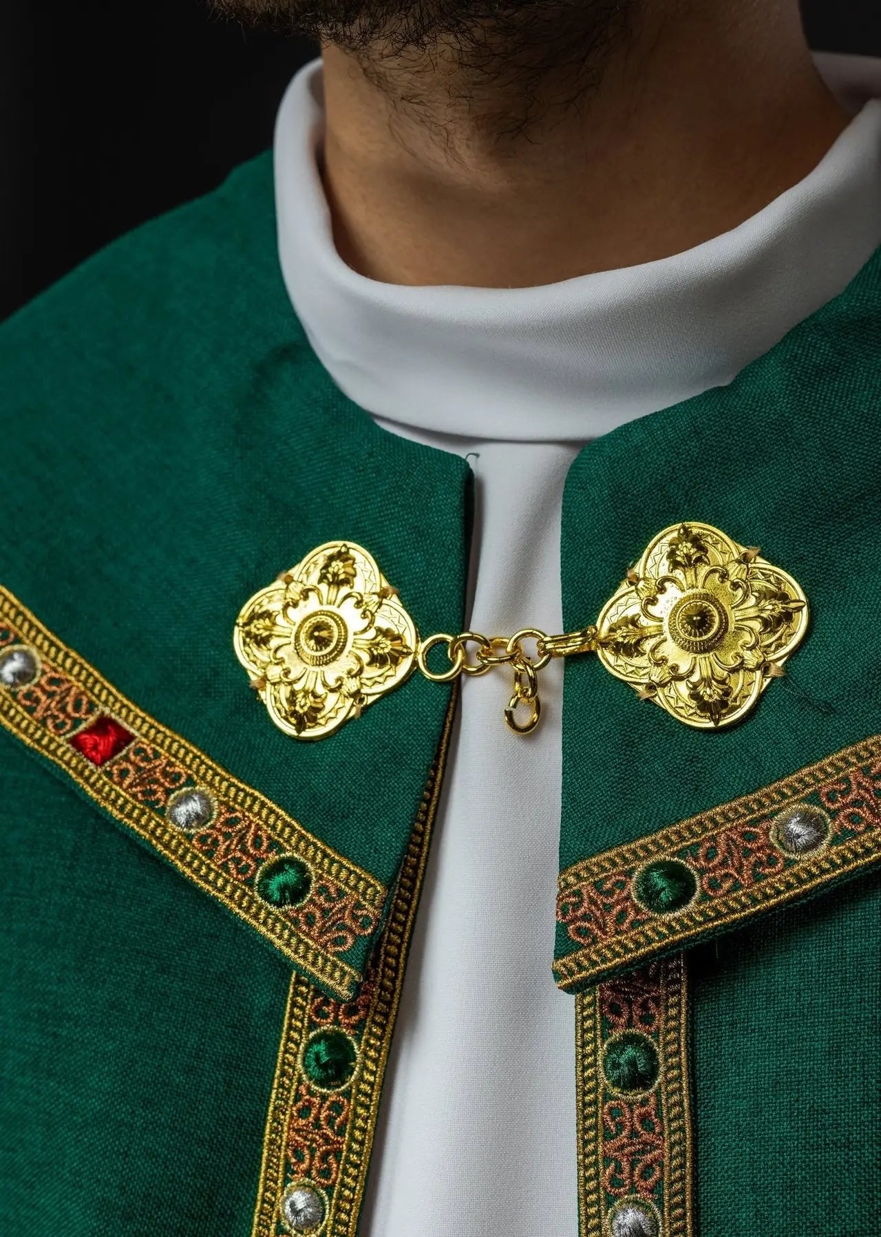 Green liturgical cape with gold IHS