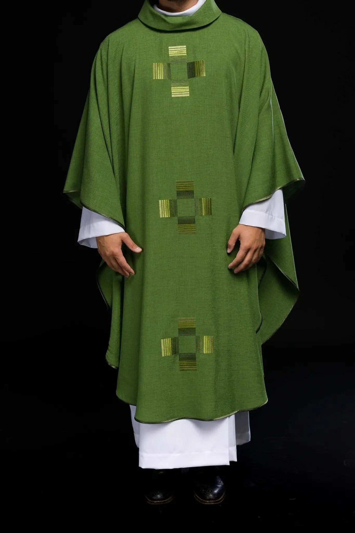 Green chasuble with embroidered crosses