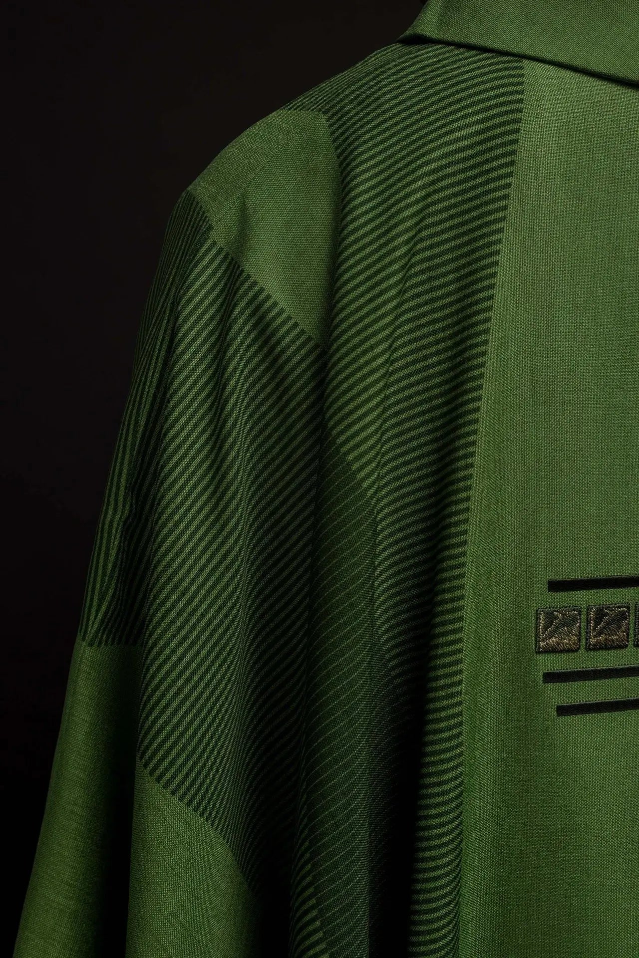Green liturgical chasuble with cross