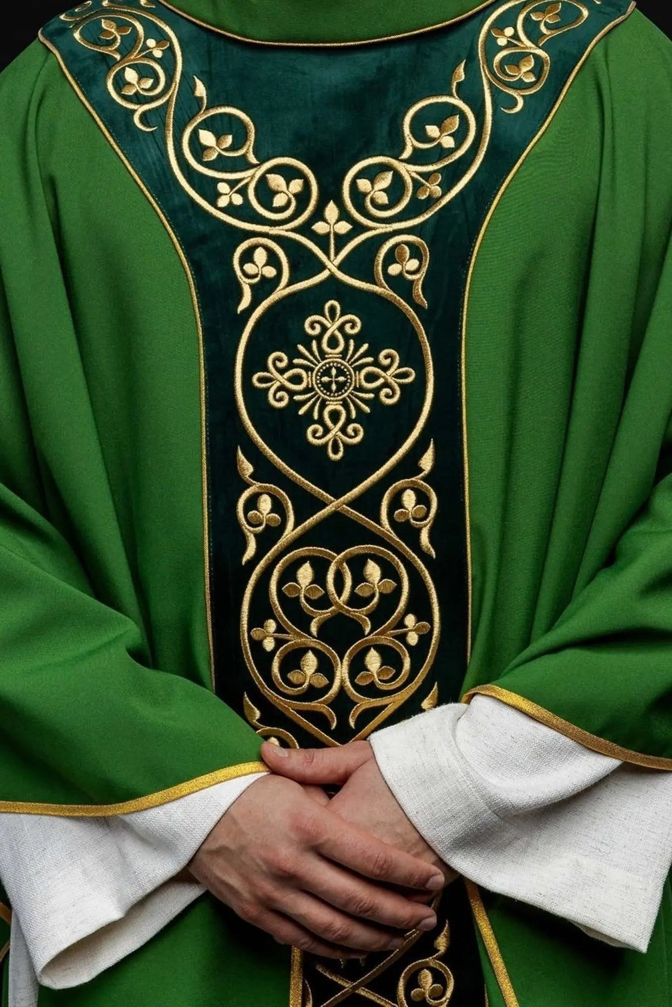 Green liturgical chasuble decorated with embroidery on velvet