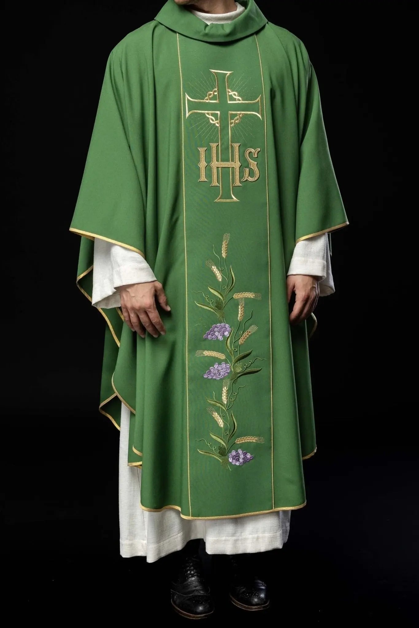 Green chasuble with decorated gold belt with IHS and ears